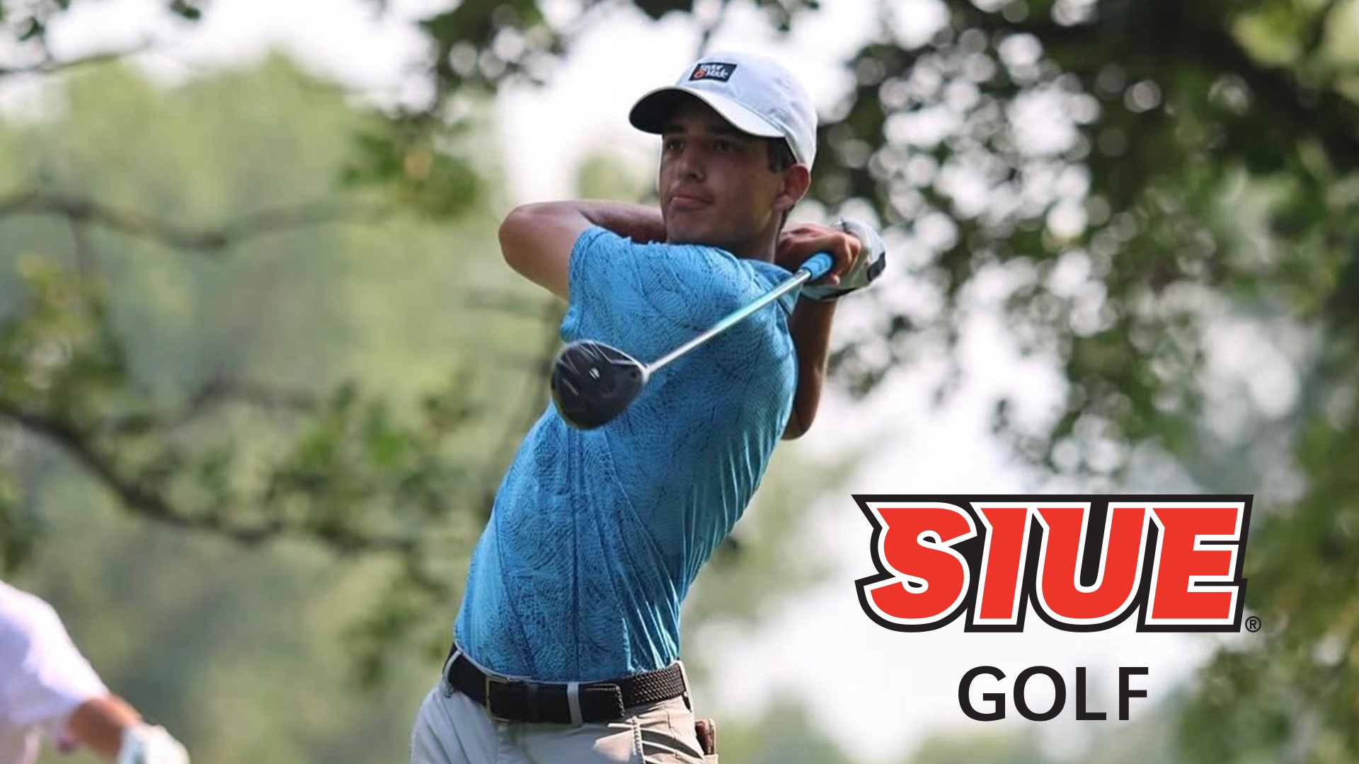 Action shot of Rajan Roth swinging a golf club with SIUE Cougars logo in bottom right