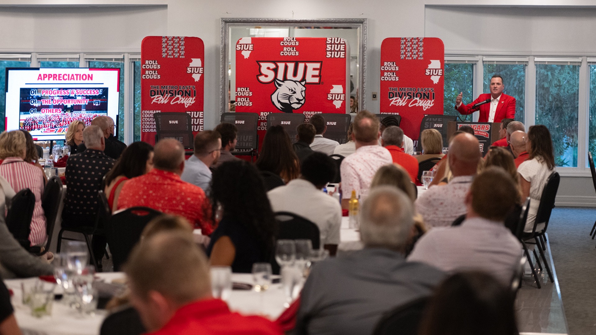 Andrew Gavin speaks to the crowd at the 2026 Cougar Champions Fund Appreciation Dinner