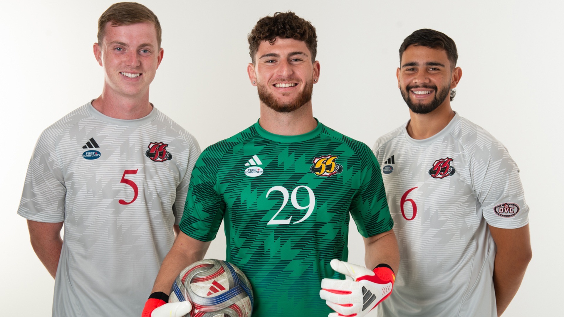 Archie McDonnell, Ioannis Koupepides, Juan Rodas pose in 66ers jerseys