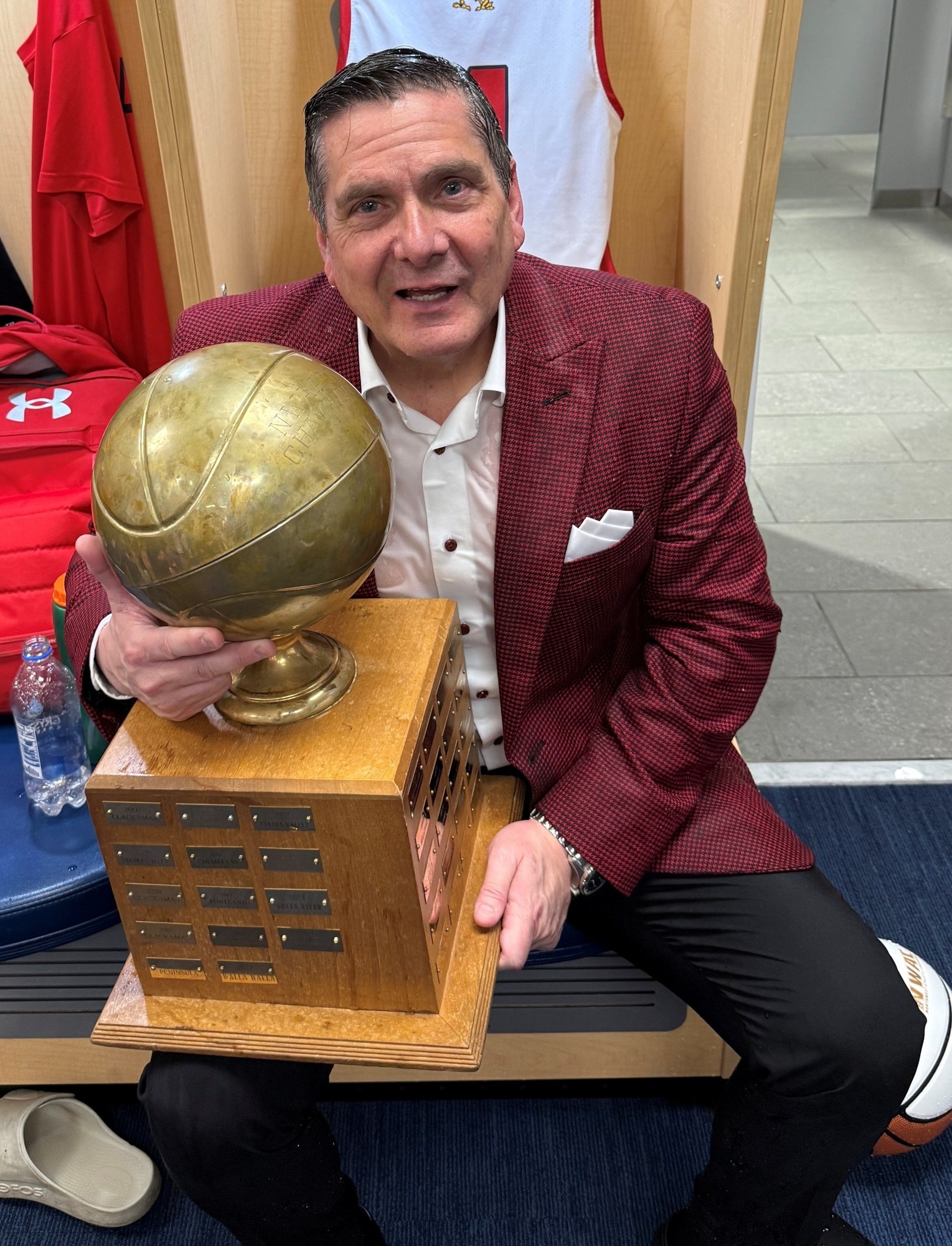 Coach Carl Howell with Trophy