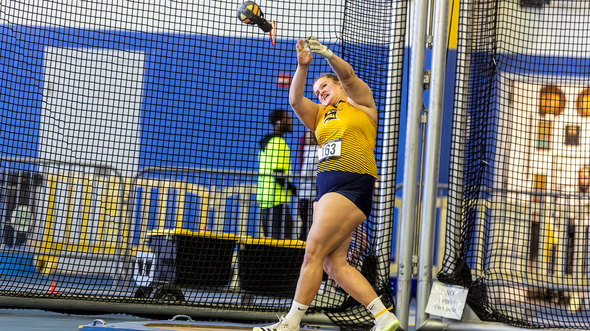 Jillian Zukley releasing weight throw at 2025 UEC Indoor Championships