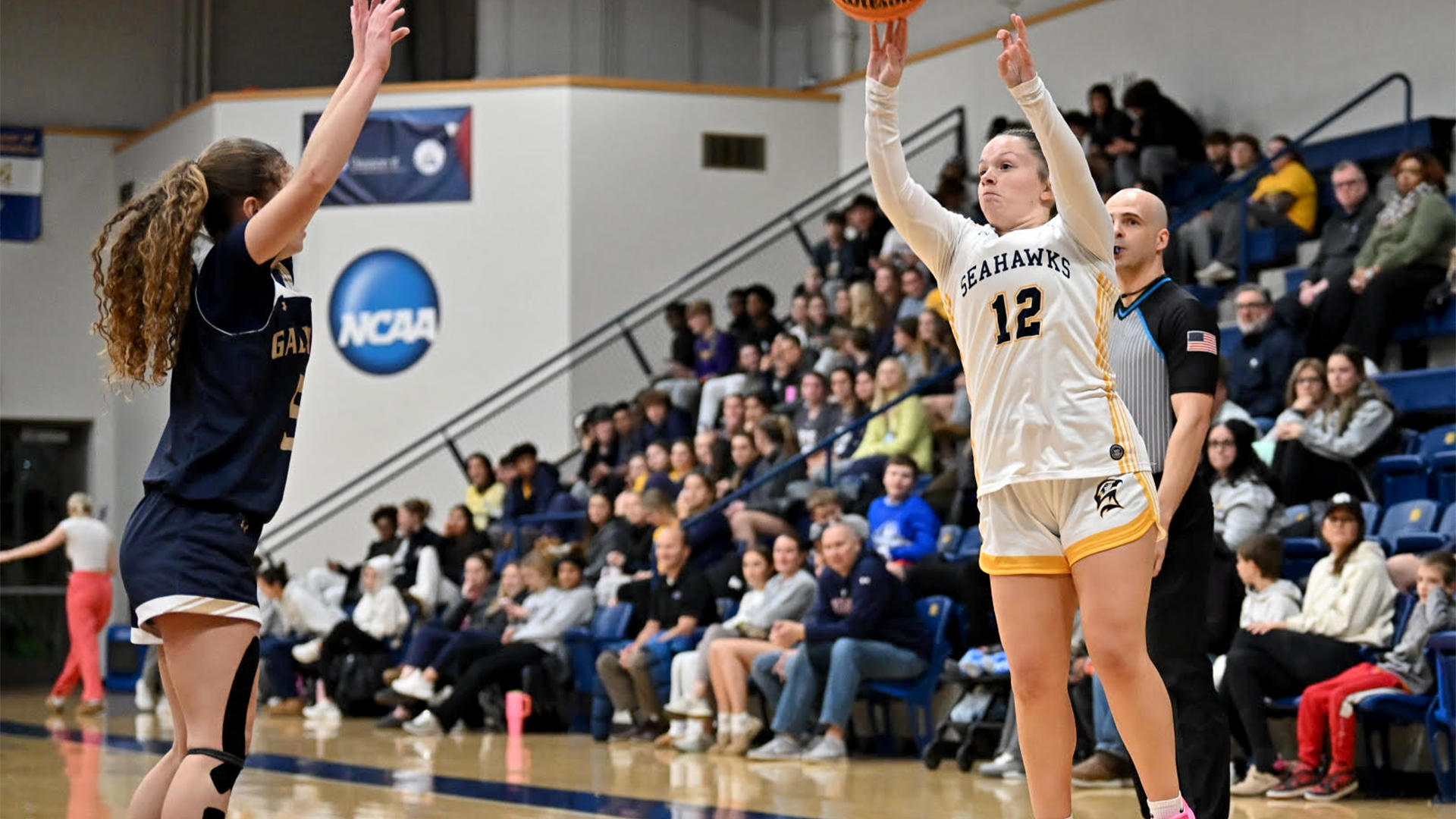 Sam Blaylock shooting a three-pointer vs. Gallaudet on Dec. 12, 2025