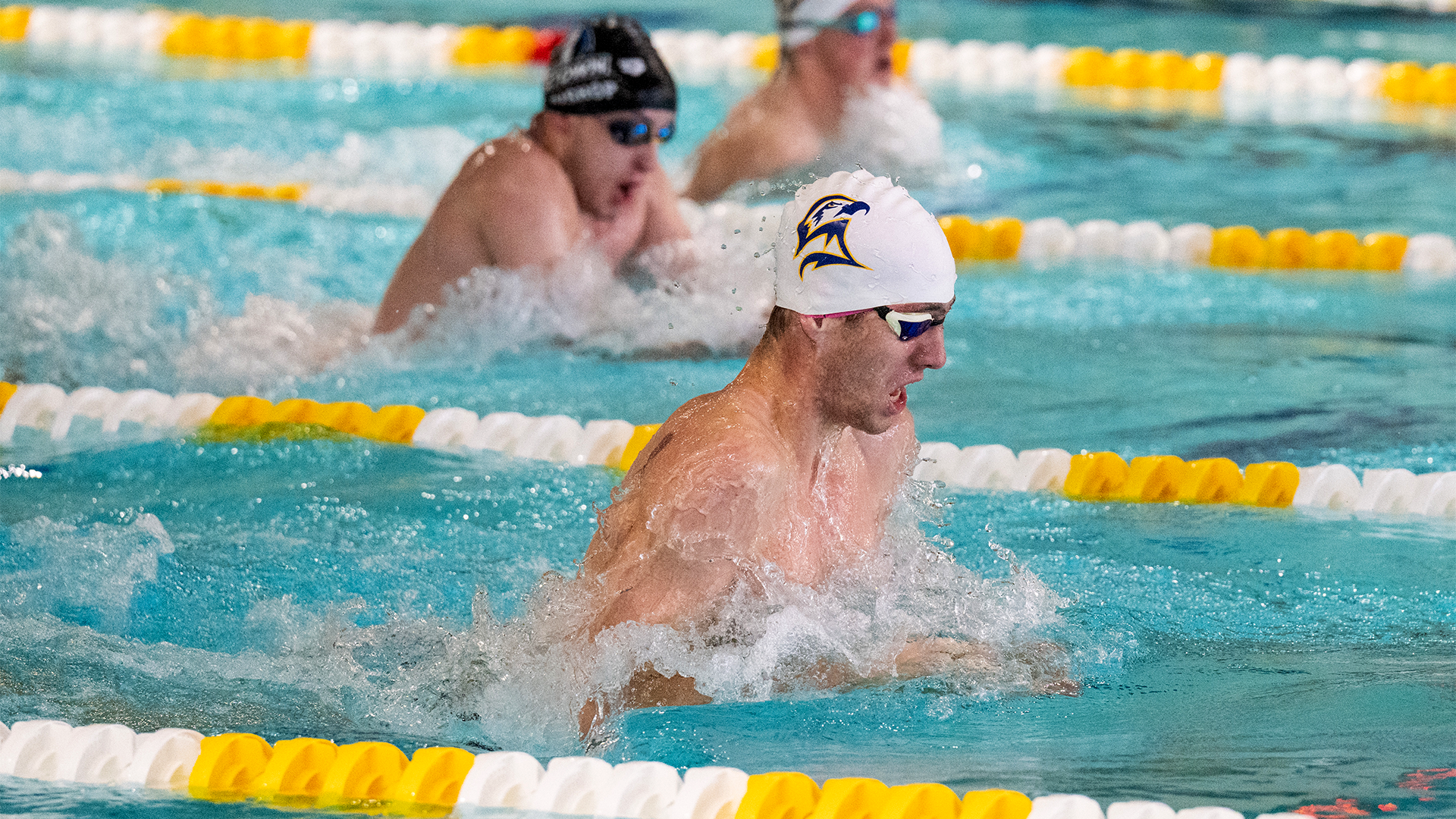Luca Fairbank doing the breaststroke against Elizabethtown on Nov. 8, 2025