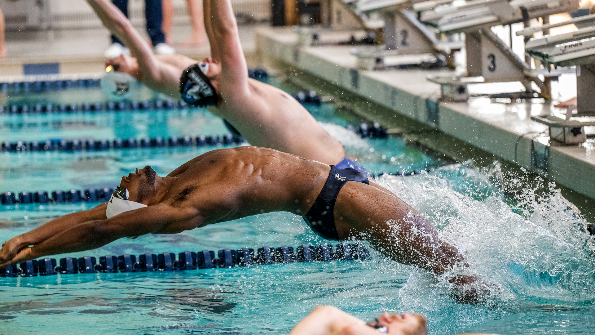 Will Kendrick taking off in the backstroke against Elizabethtown on Nov. 8, 2025
