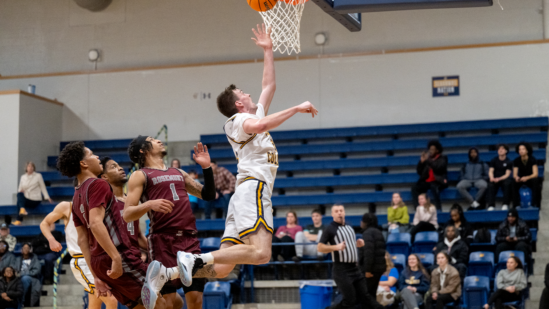 Jake Koverman going up for the layup against Rosemont on January 21, 2026