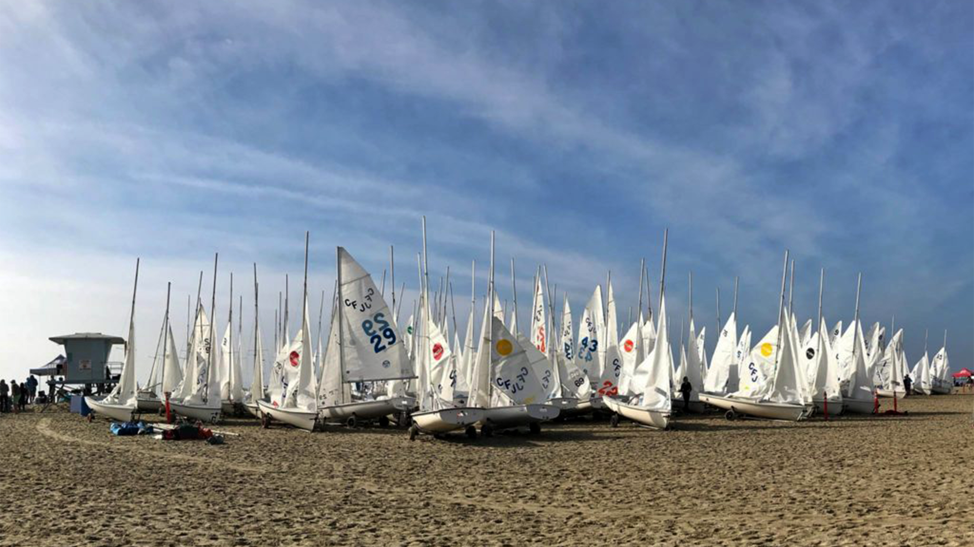 Photo of dinghies on sand in Long Beach, Calif.