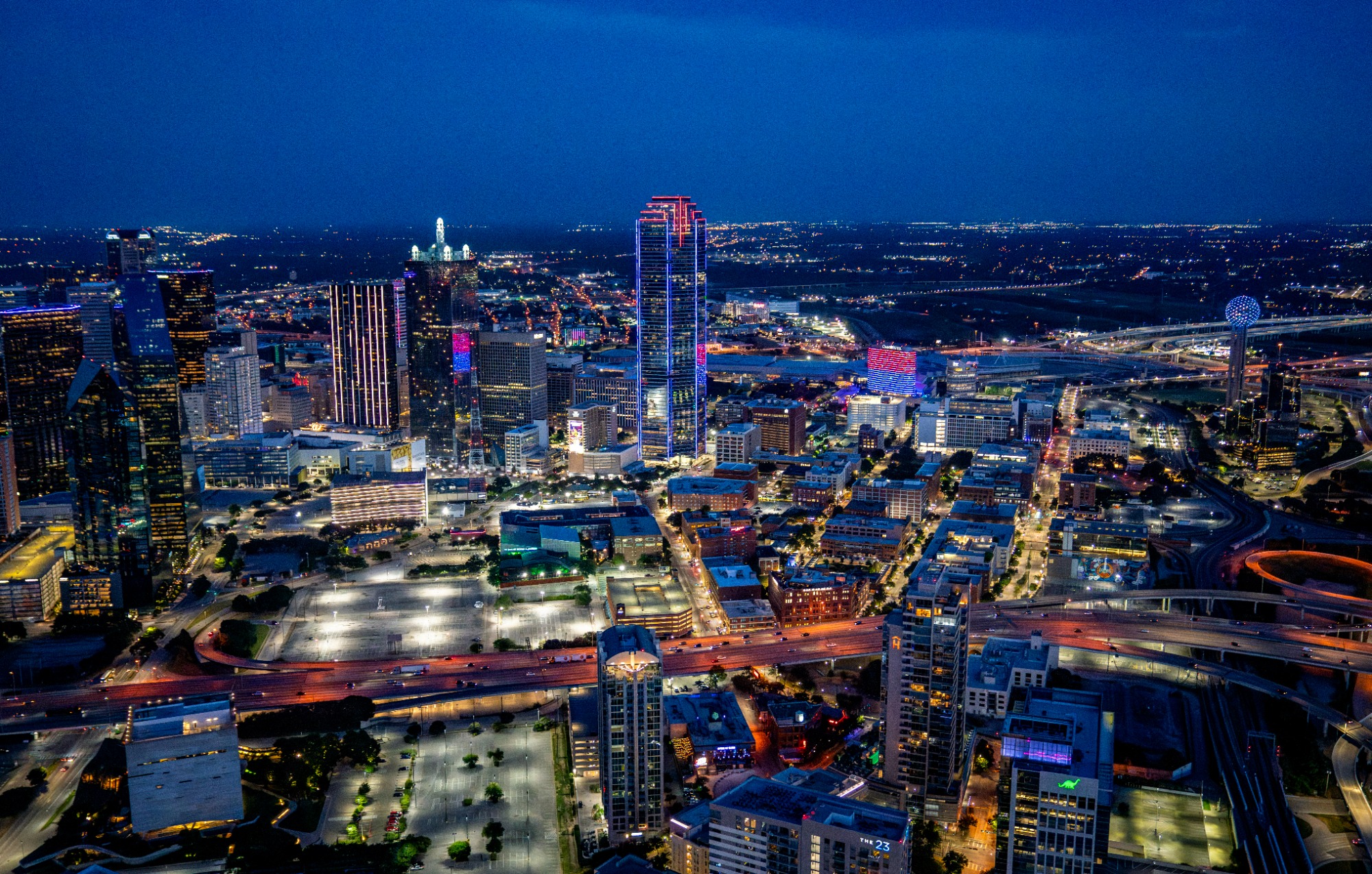 The SMU campus and the Dallas skyline are lit up with blue and red lights in recognition of SMU joining the Alantic Coast Conference Monday, July 1, 2024, in Dallas.Job 25-034