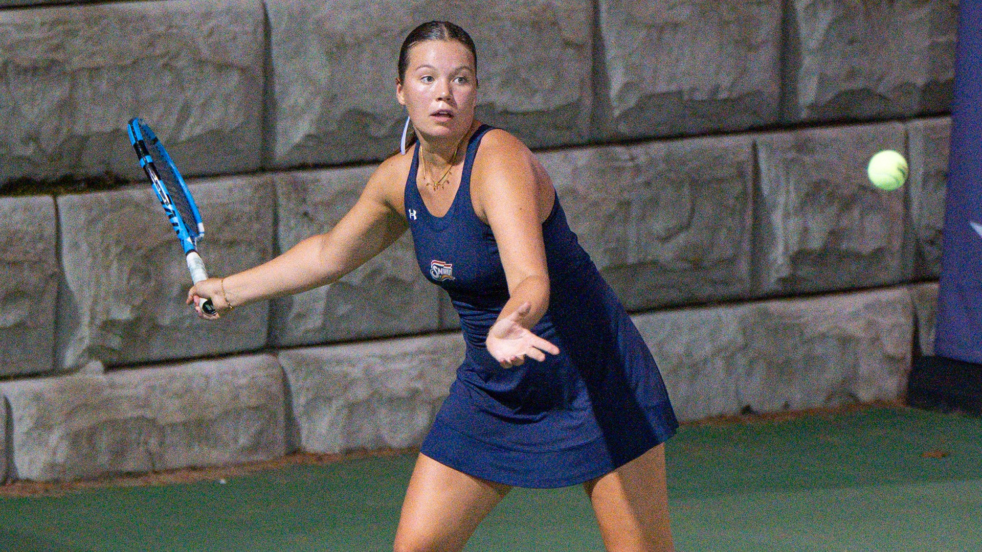Eyglo Armansndottir hitting a forehand shot