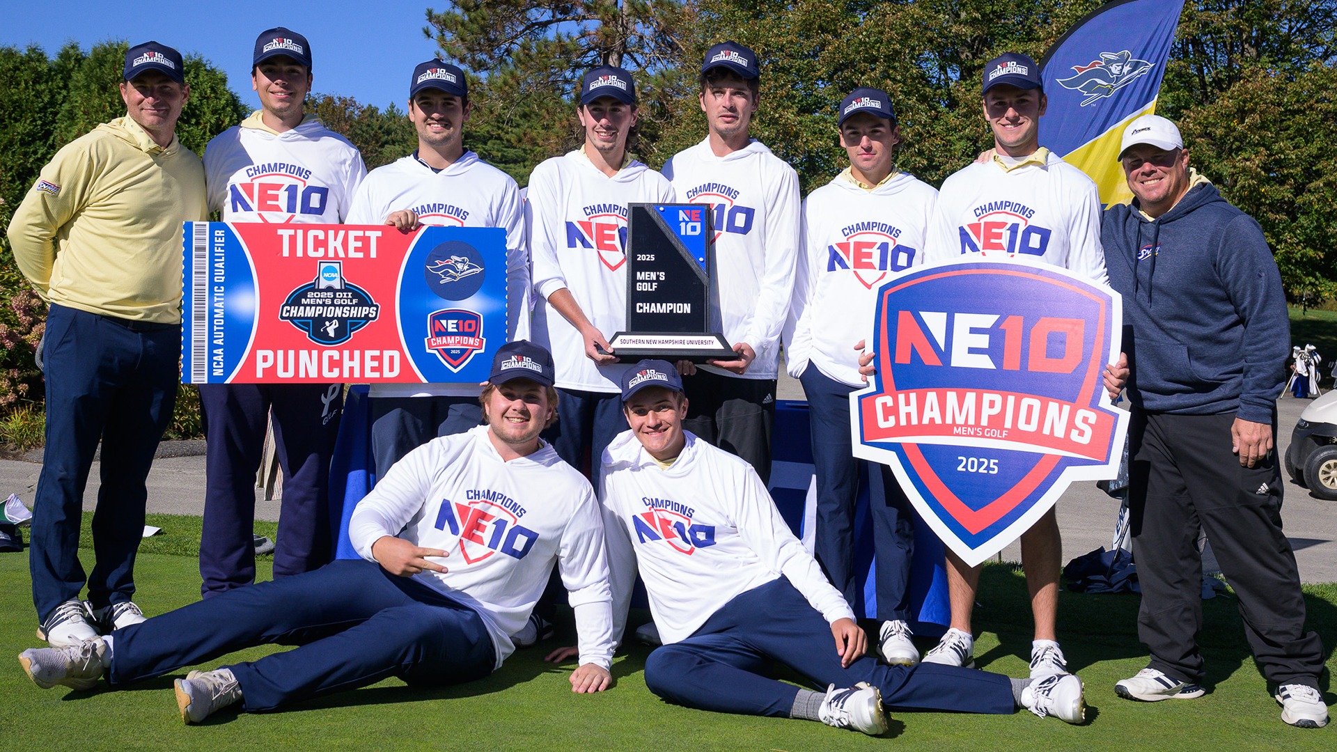 the SNHU men's golf team posing after winning the 2025 NE10 Championsip