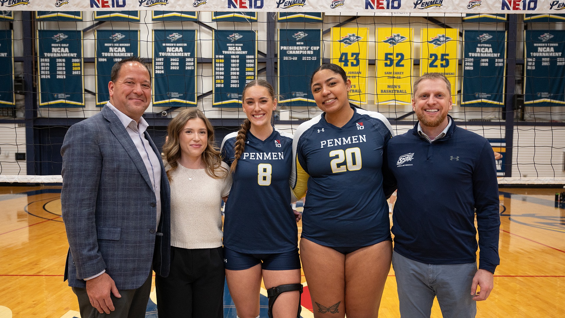 the SNHU women's volleyball class of 2025 posing on Senior Day with the coaching staff