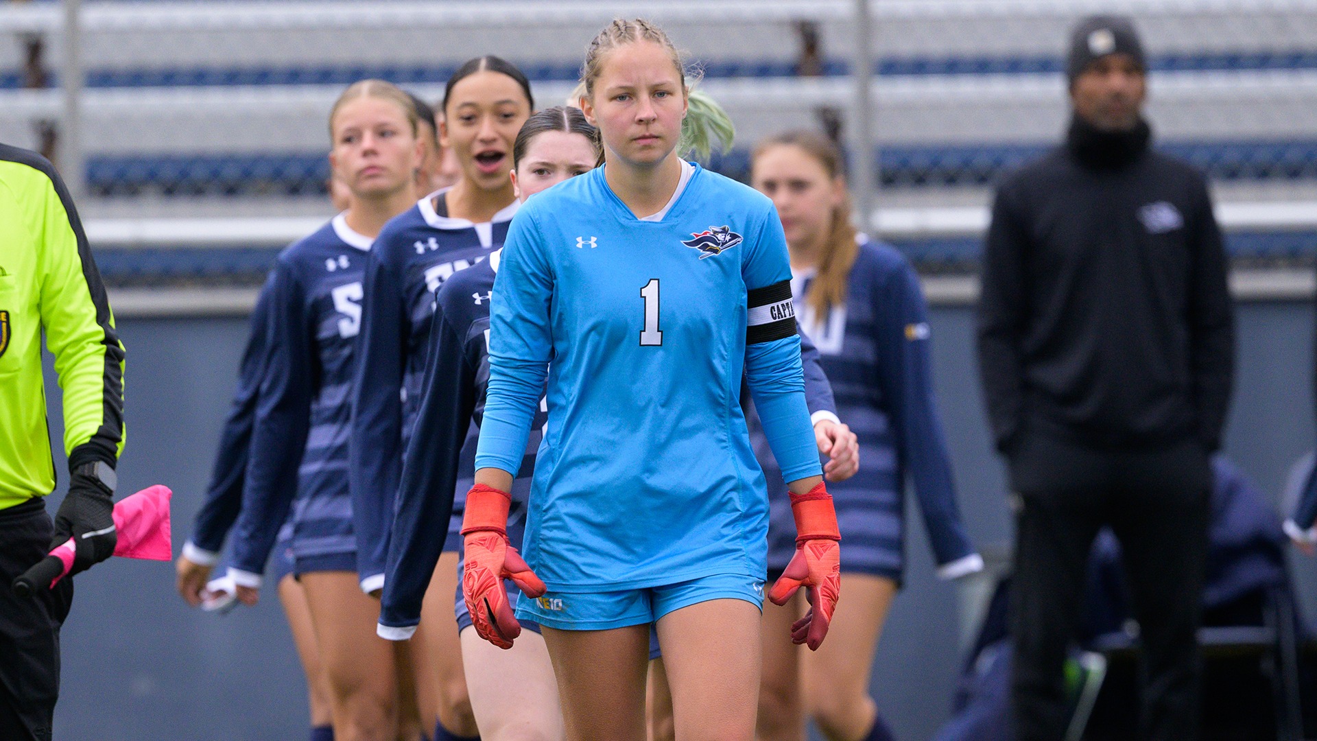 members of the SNHU women's soccer starting lineup during the international walkout prior to a match