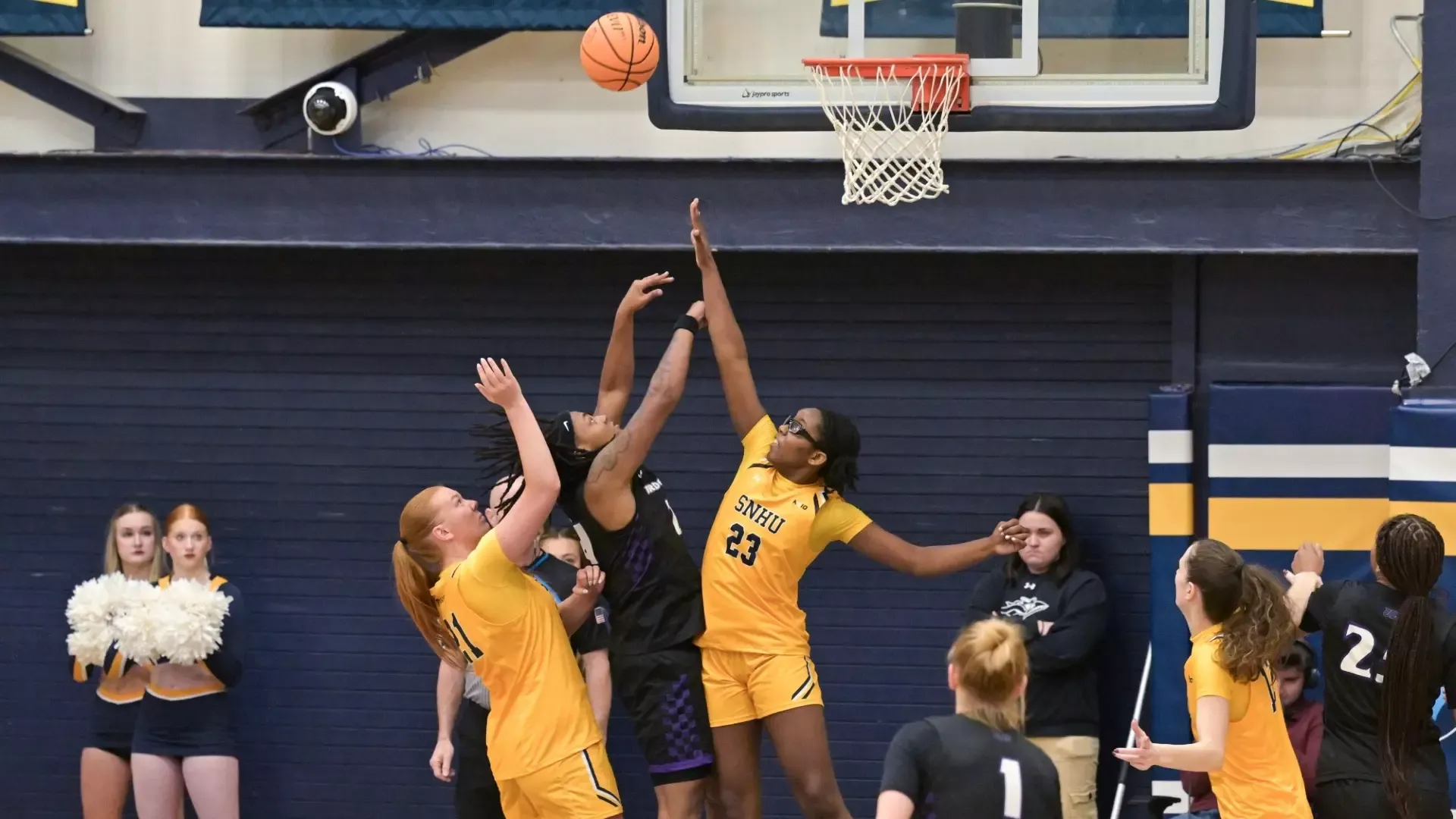 Aniela Kwo of women's basketball defends the basket