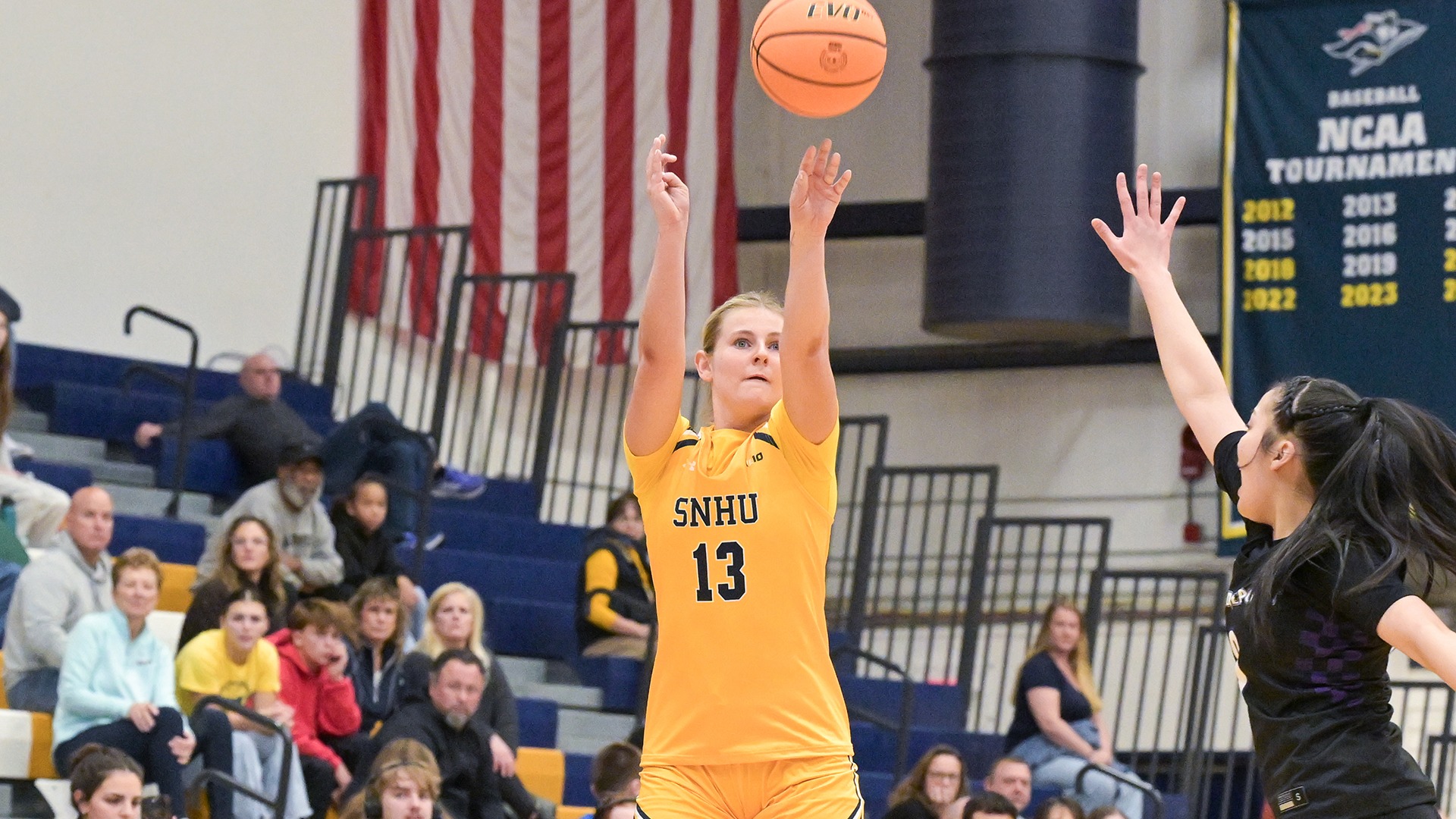 Kameron St. Pierre shooting a 3-pointer, as a defender closes out
