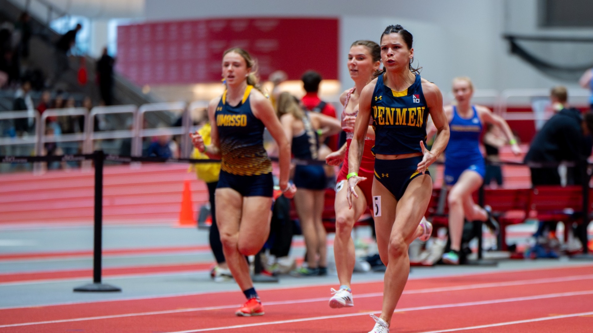 Hope Sinclair running a sprint race for SNHU