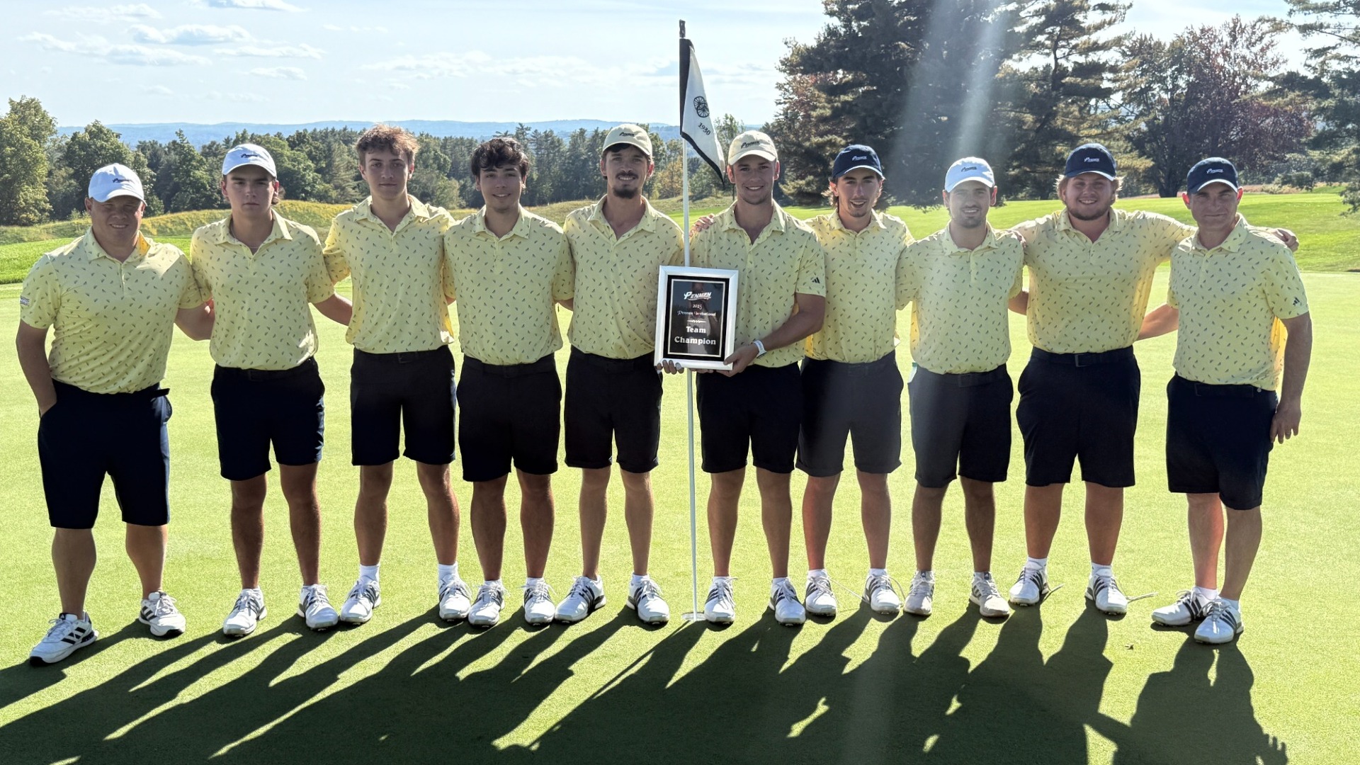 The men's golf team celebrates a win at the Penmen Fall Invitational at Concord Country Club 