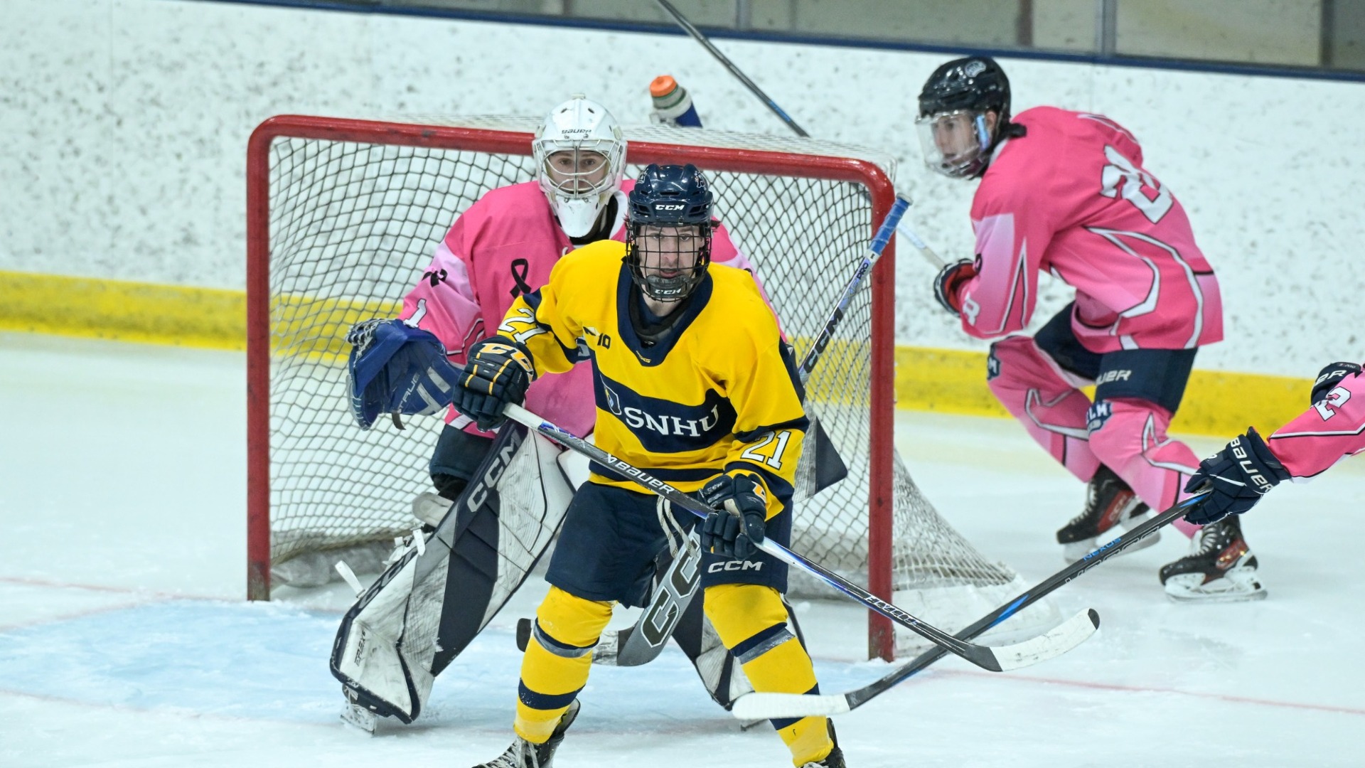 Stone Devlin stands in front of the Saint Anselm net