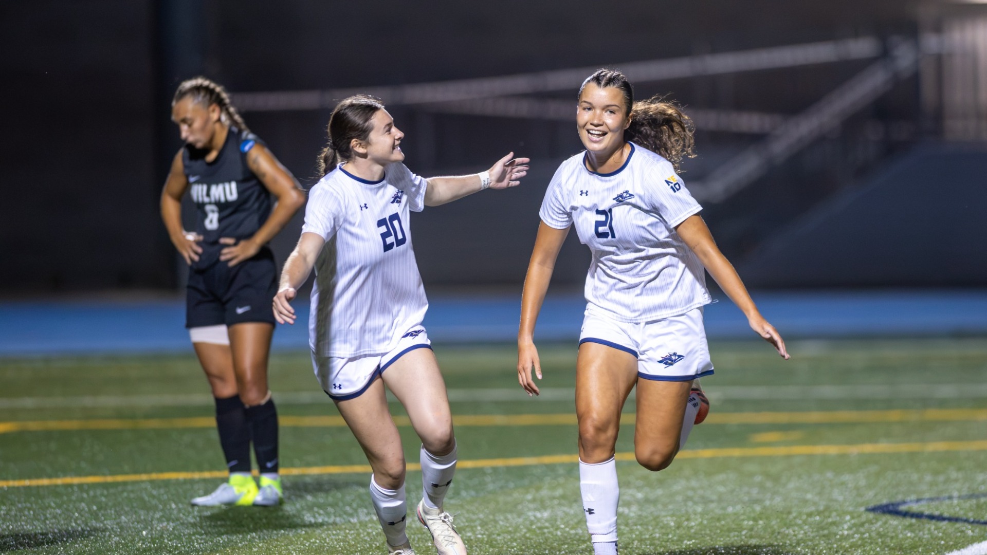Lauren Fox of SNHU women's soccer appears smiling after converting a shot