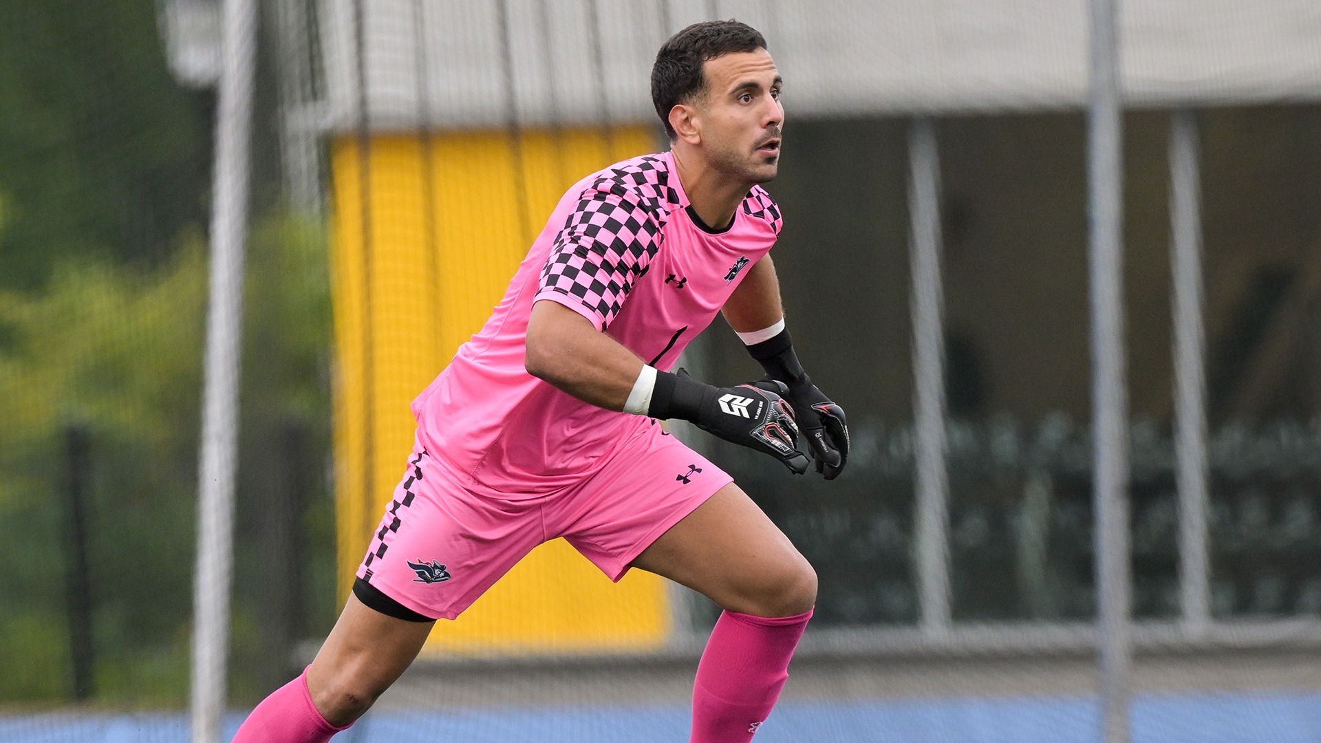 Alvaro Garcia running toward the ball