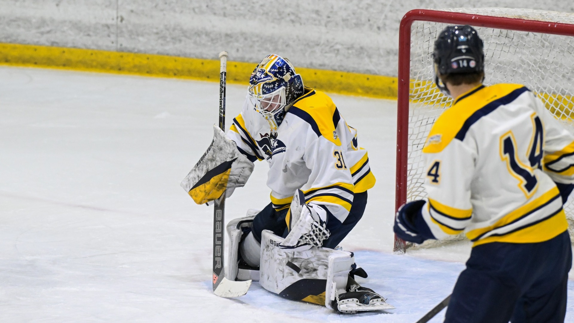Goalie Sean Guerin and Zach Vickerman for the Penmen