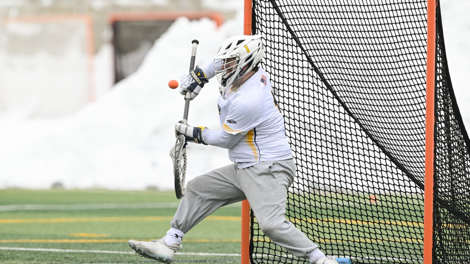 Goalie Matt Roy making a save for the Penmen