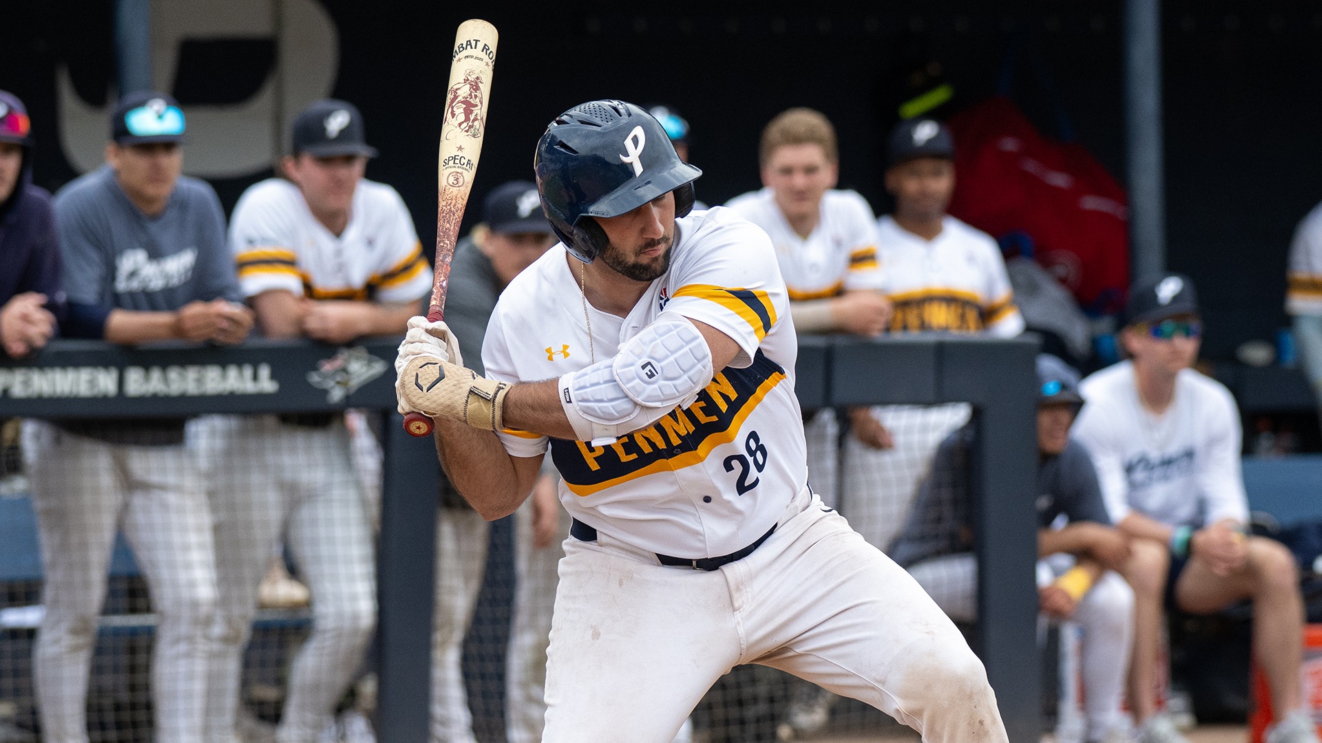Jake Pisano watches a pinch during an at bat