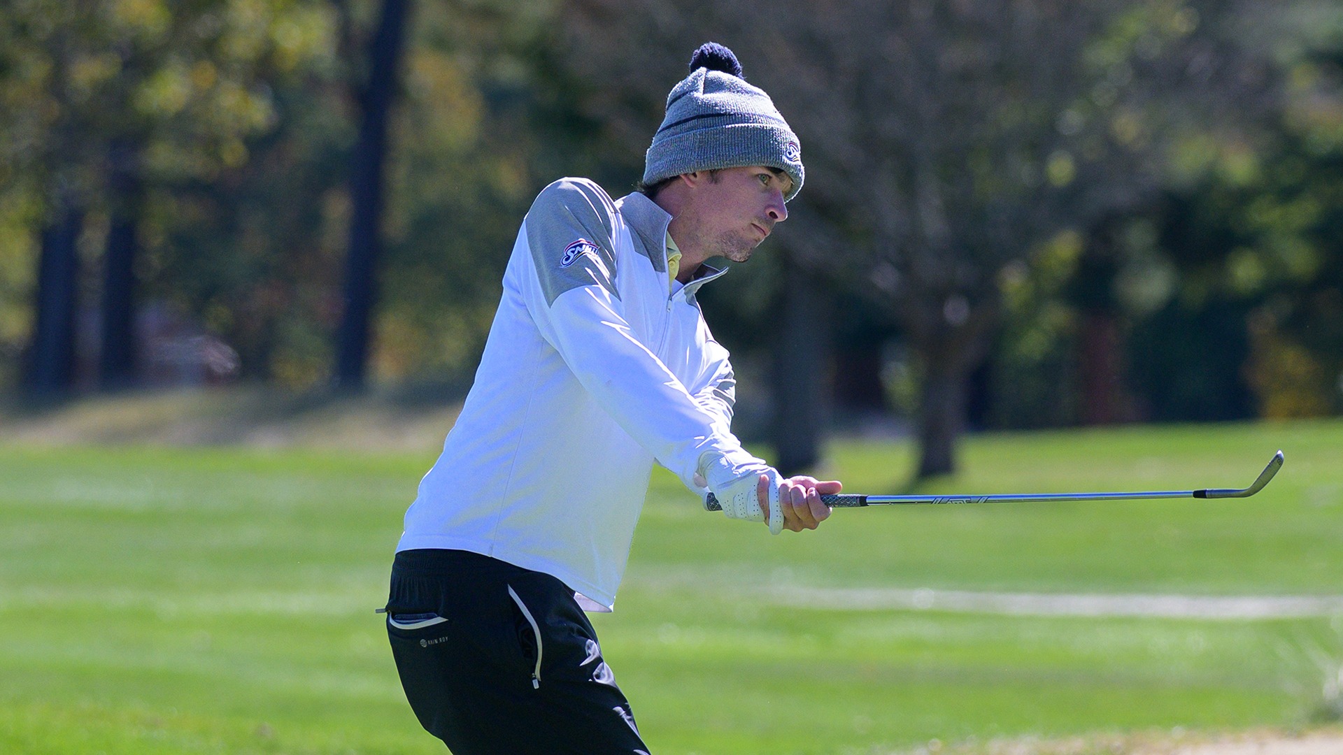 Sean Dully watching his chip shot