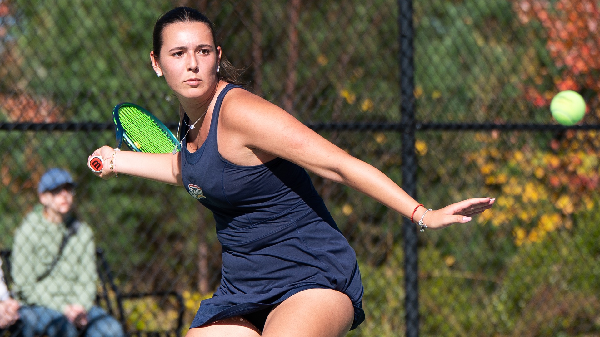 Dajana Abadzic hitting a forehand shot