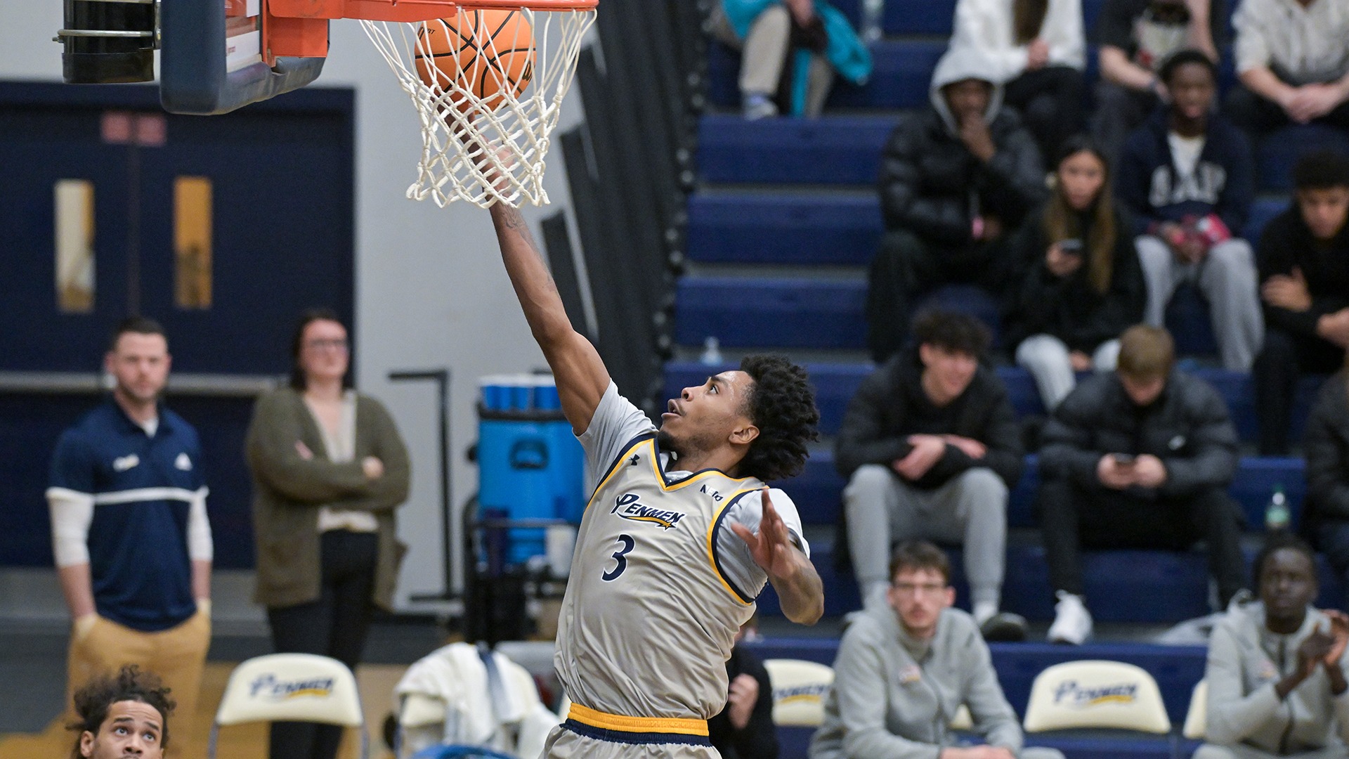 T.J. Morris soaring to the rim for a layup