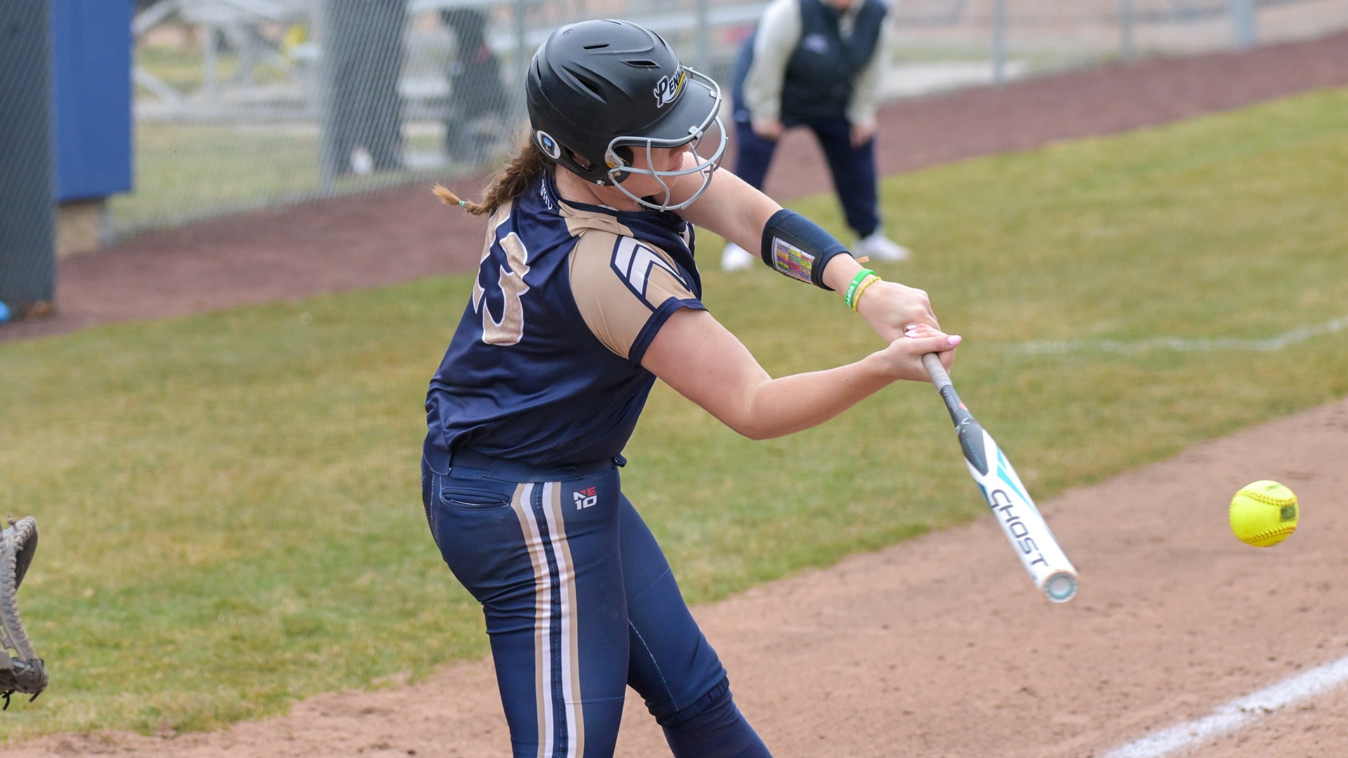 Abby Lineman swinging at a pitch