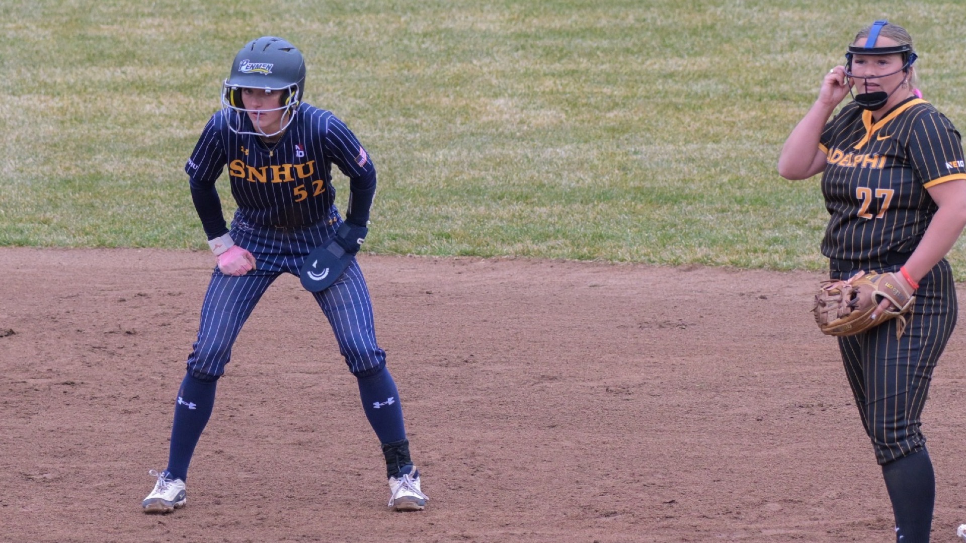 Payton Bryson takes a lead after reaching base for softball