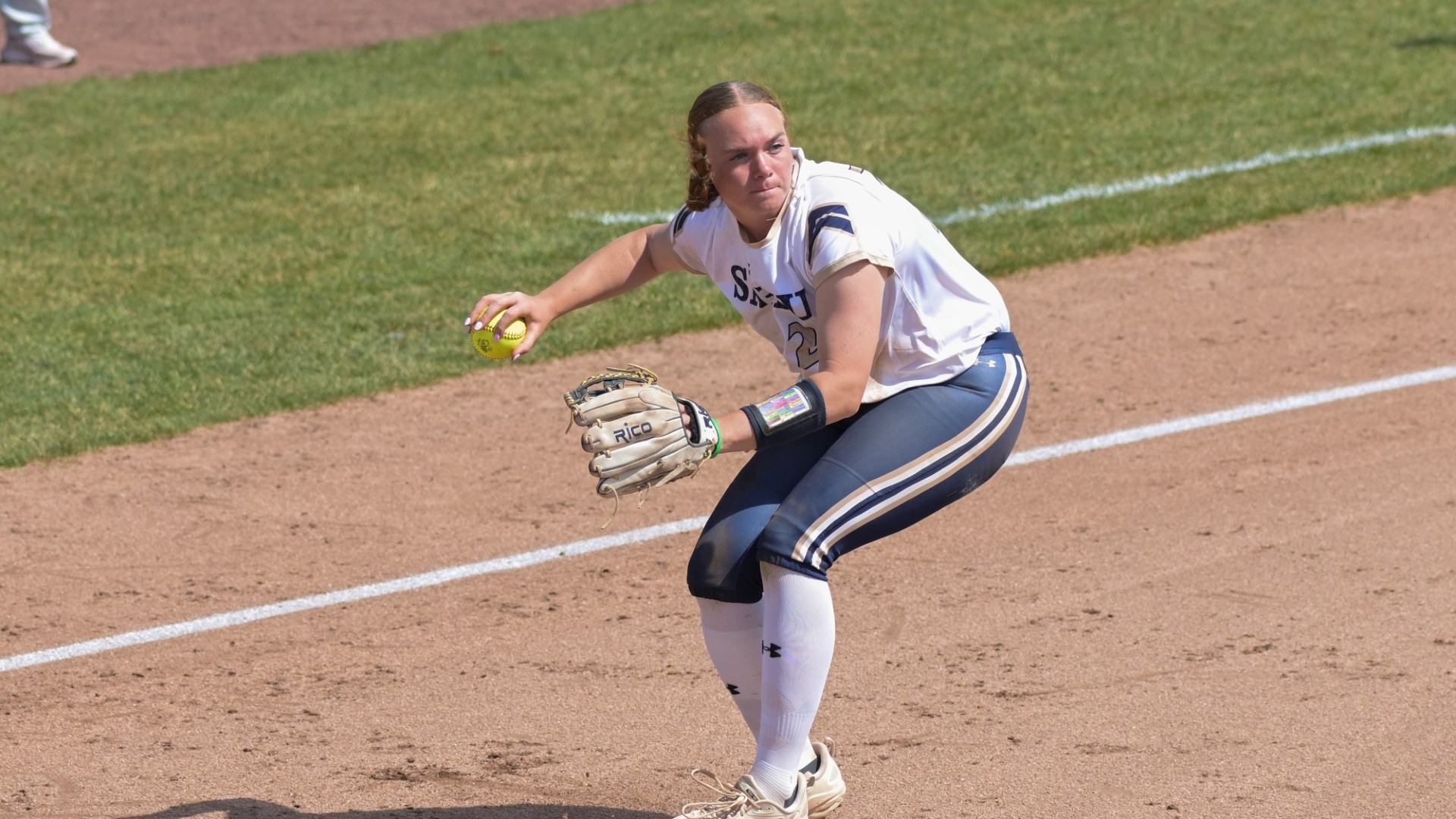 Abby Lineman is pictured at third base
