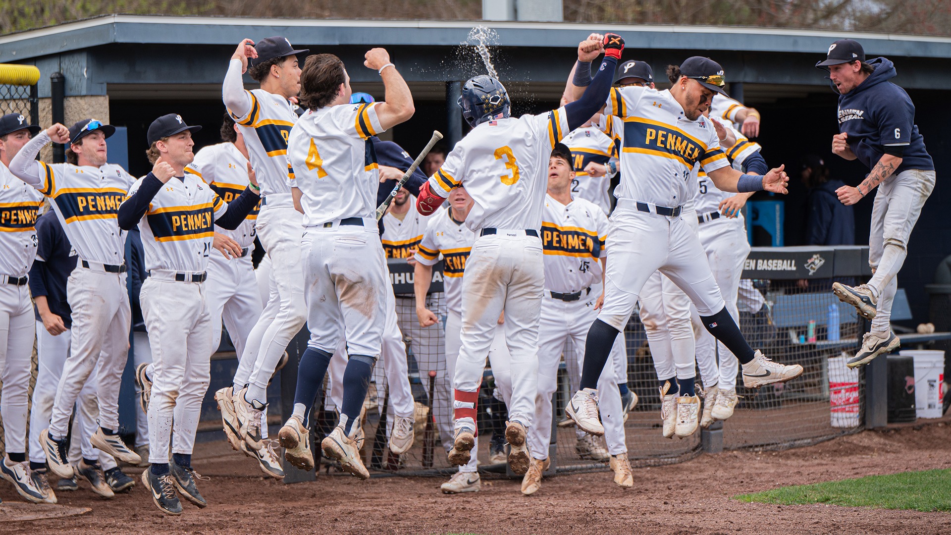 Joel Valera celebrating with teammates following his home run
