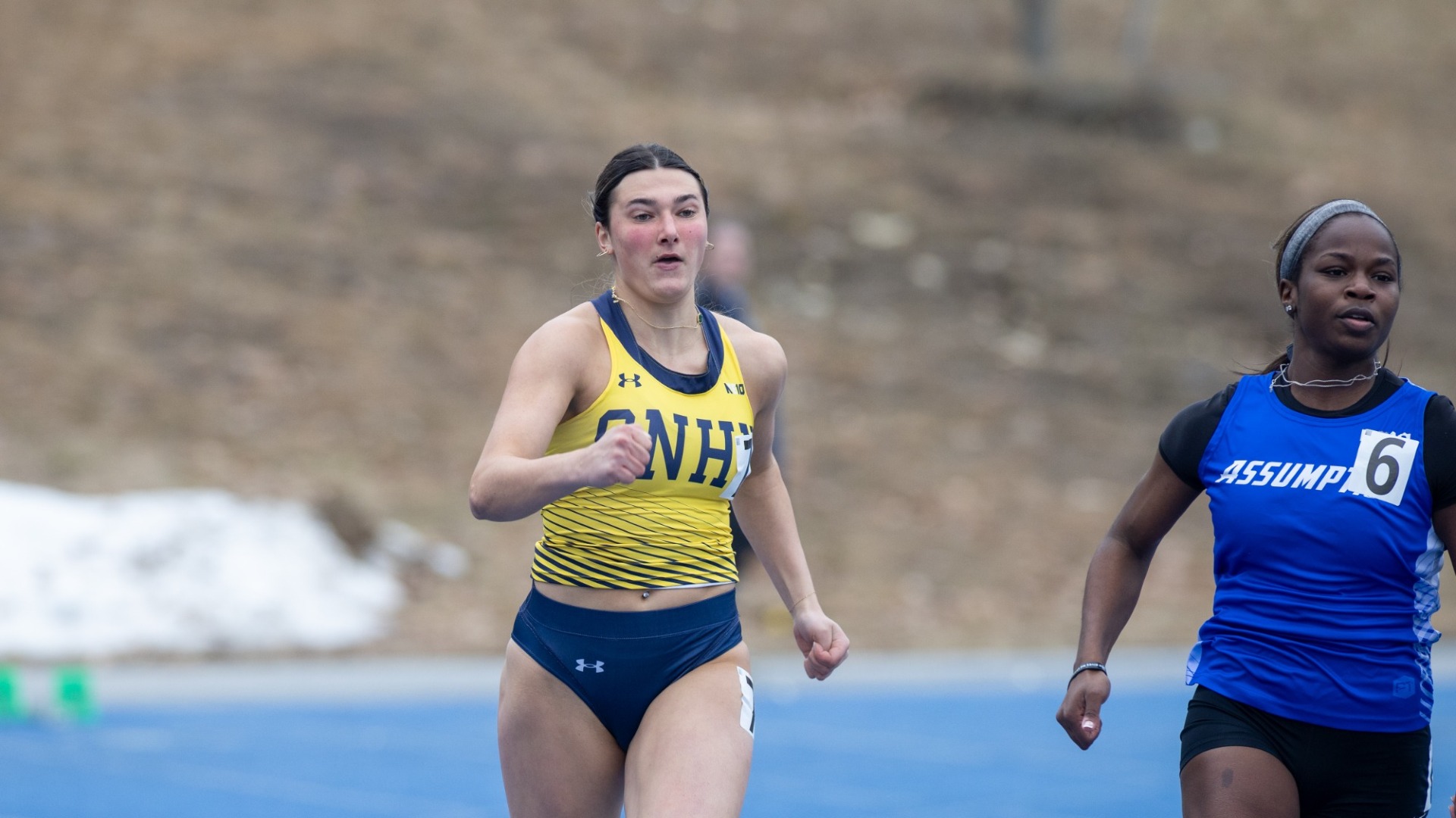 Hannah Sippel shown trying to rundown an opponent for Track & Field