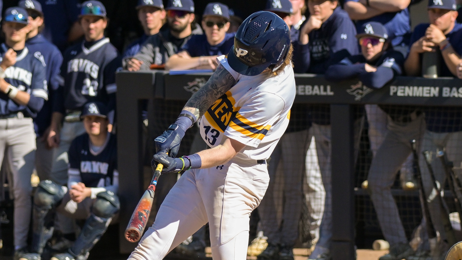 Dakota Britt swinging at a pitch