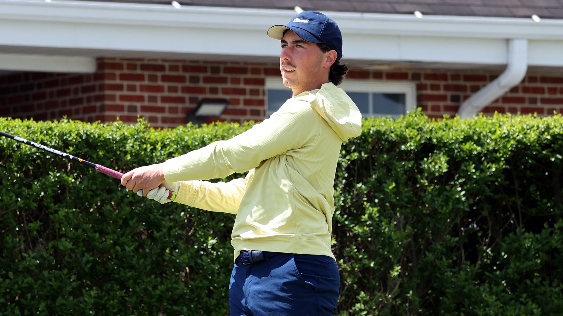 Andrew Surprenant watching his iron shot