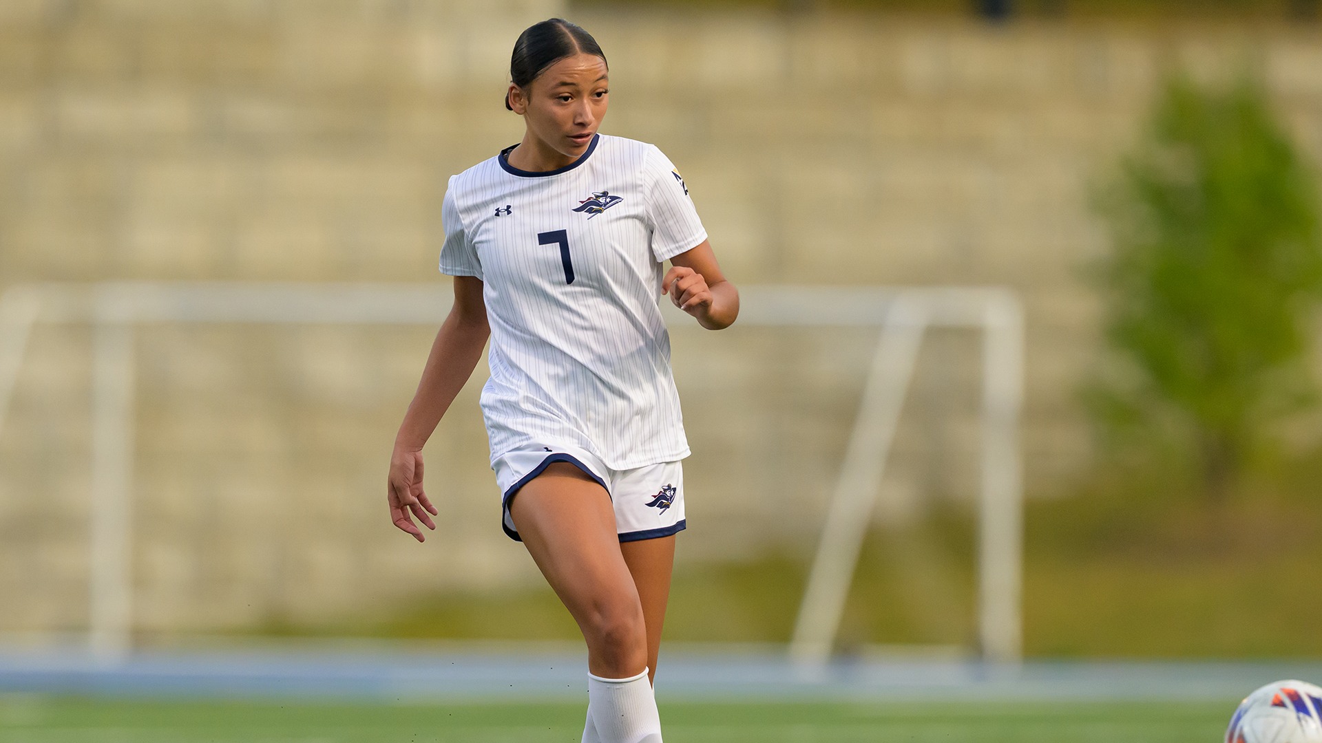 Avary Hall kicking the ball
