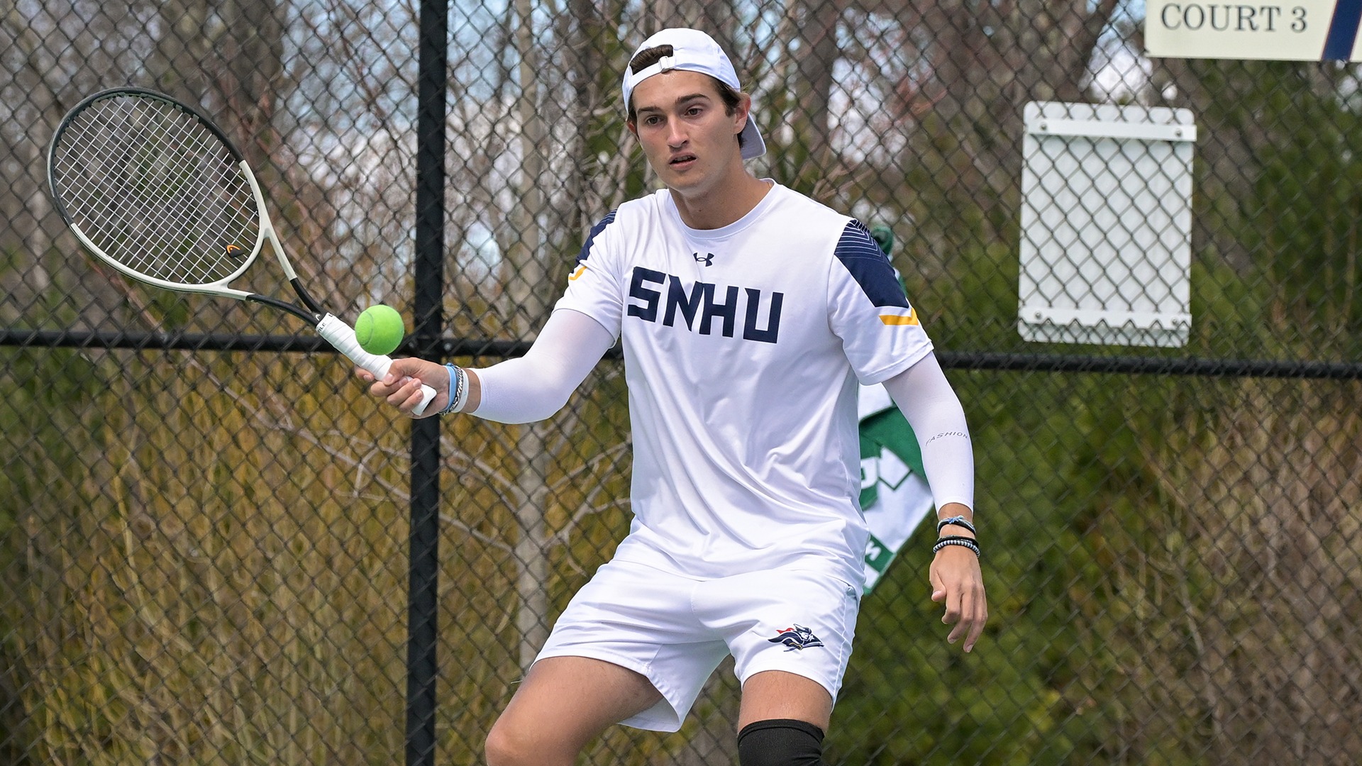 Carlos Molero hitting a forehand shot