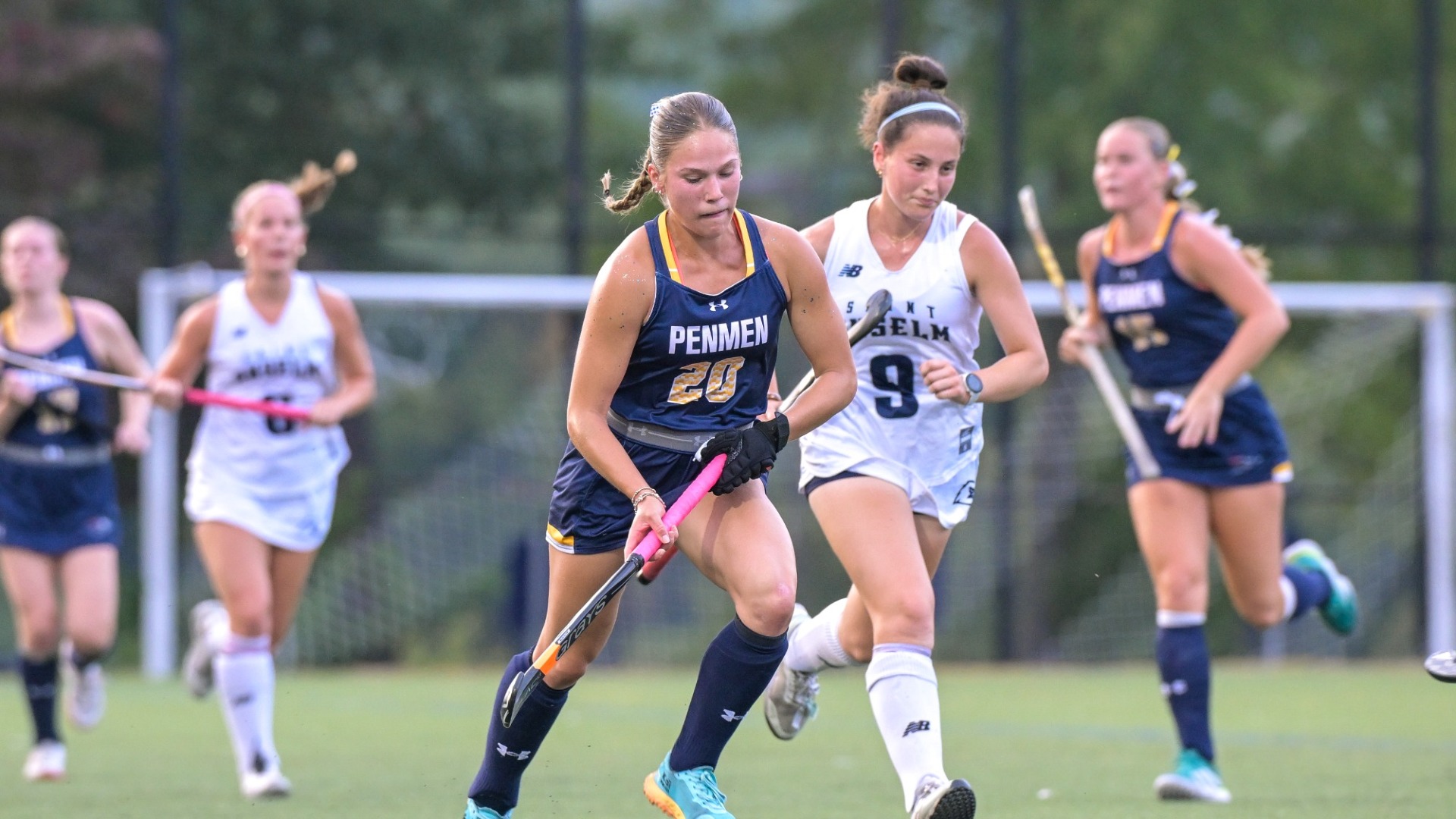 Zoe Demers advances with the ball for field hockey