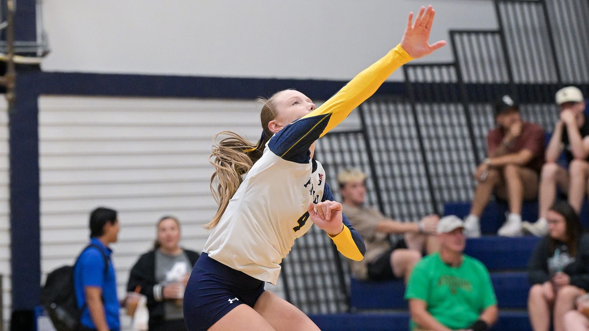 Jordyn Carroll serving the ball