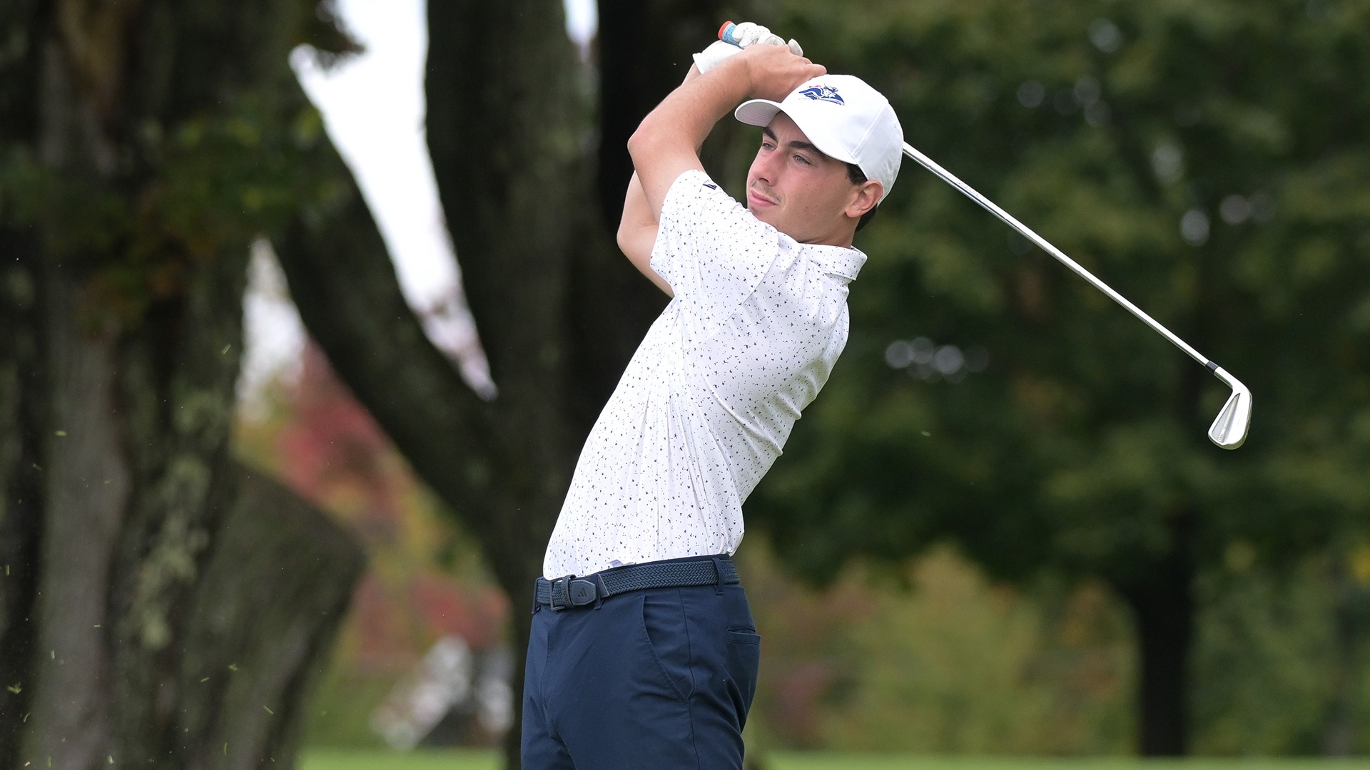 Andrew Surprenant watching his iron shot