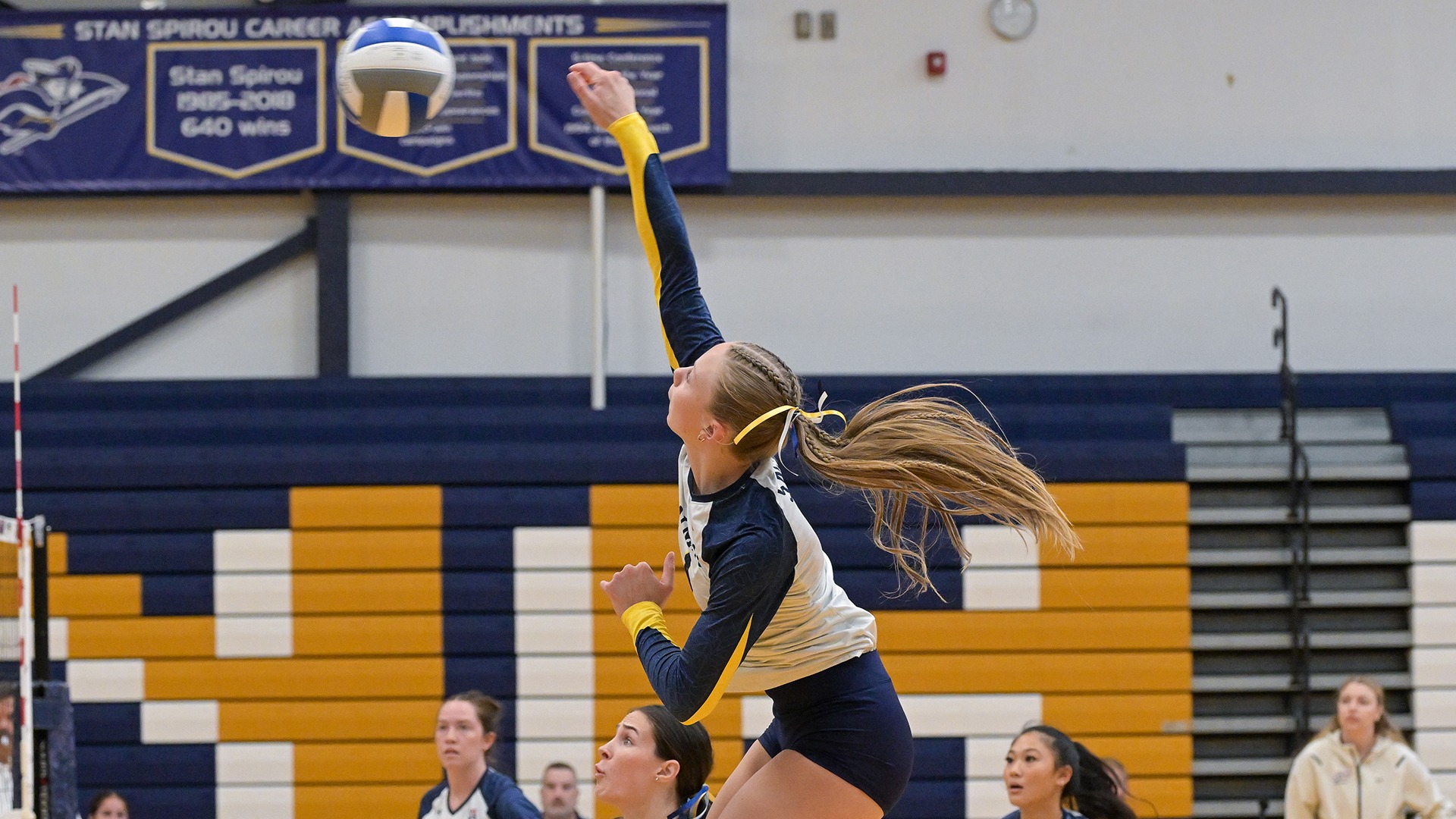 Jordyn Carroll attacking the ball near the net