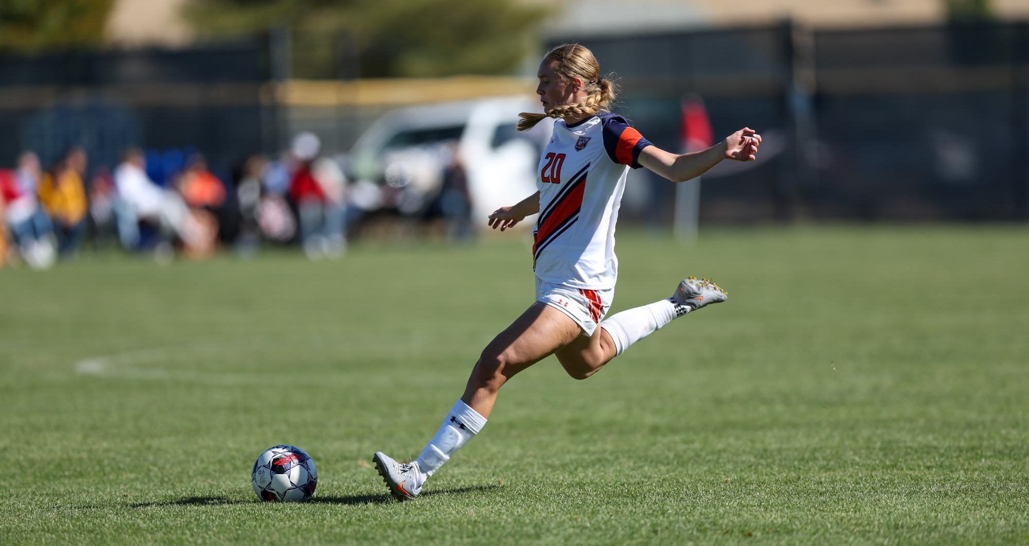 Carly Knudsen striking the ball