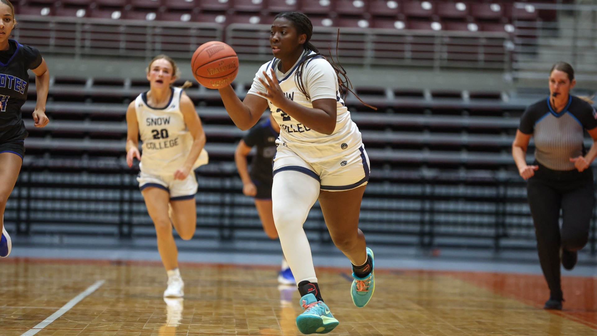 Hillary Akomatsri bringing the ball up the court. 