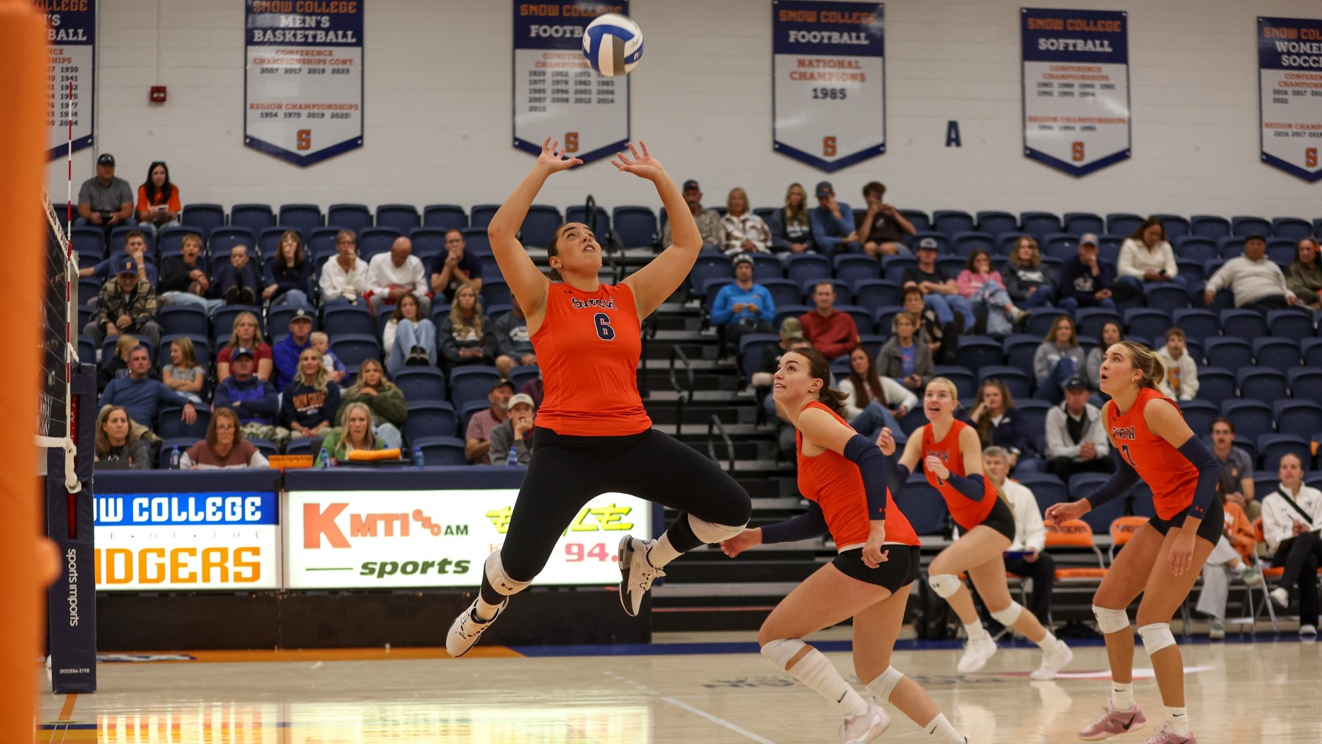 Ema Thompson setting the ball for a devastating spike