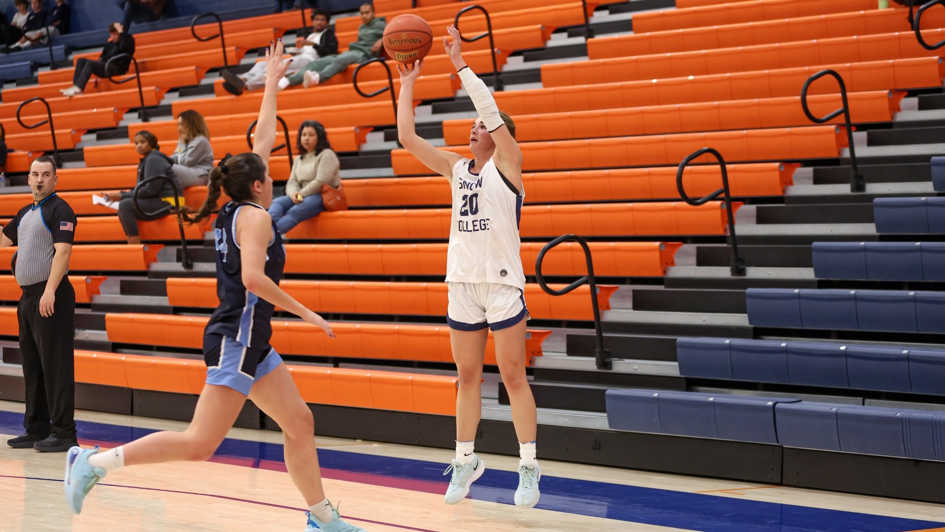 June Olsen pulling up for three against Otero Junior College