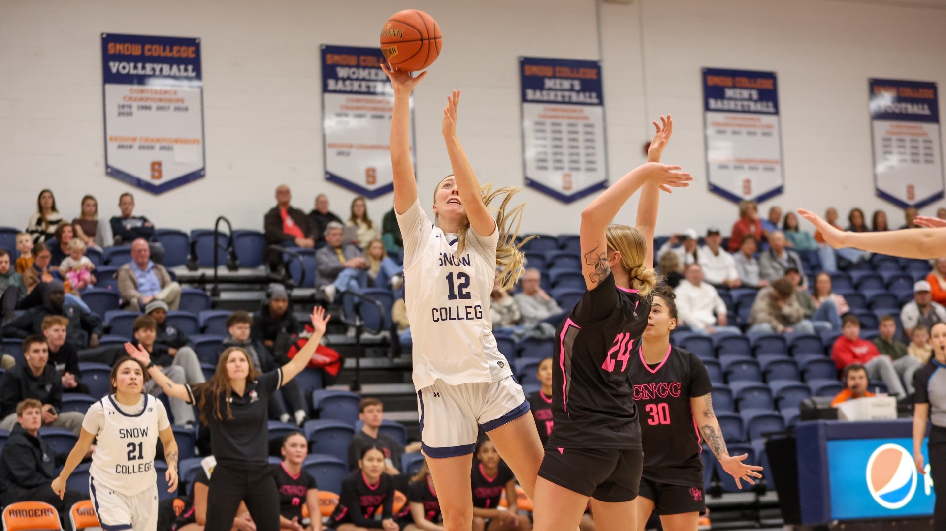 Sydnee Smith going up to the basket with a layup
