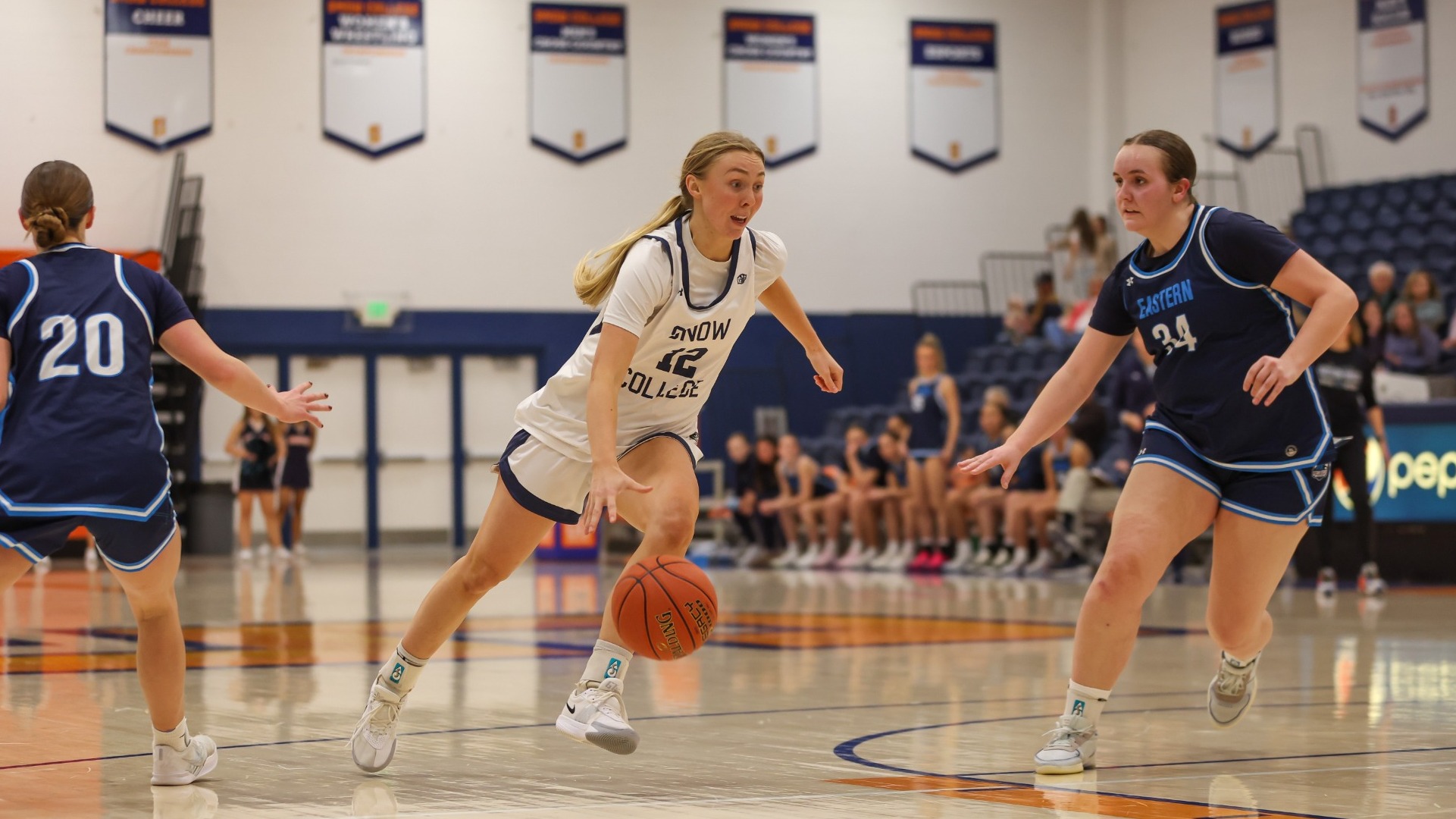 Sydnee Smith driving to the hoop against USUE