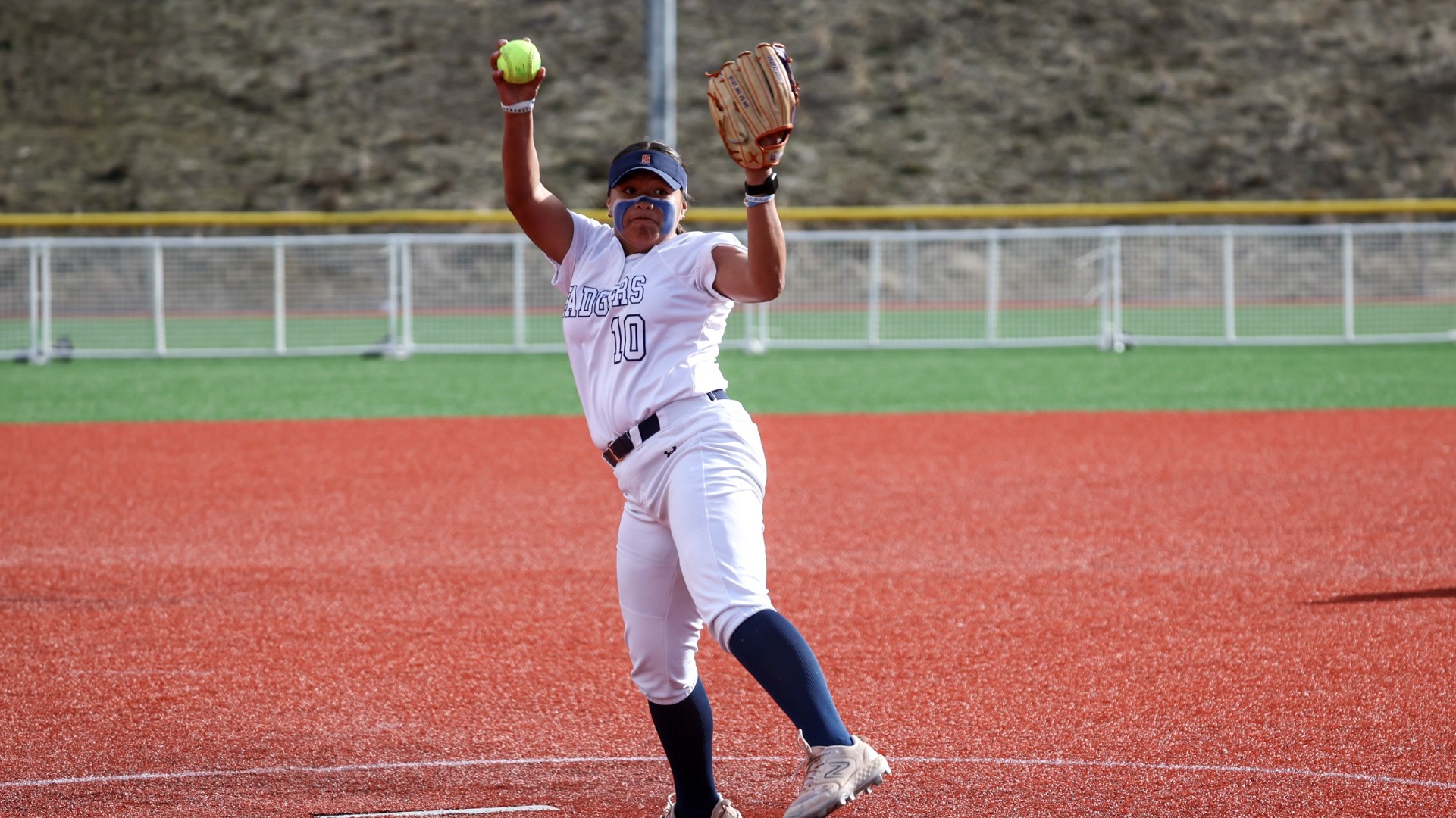 Taimane Laolagi-Aloy winding up a pitch against NIC