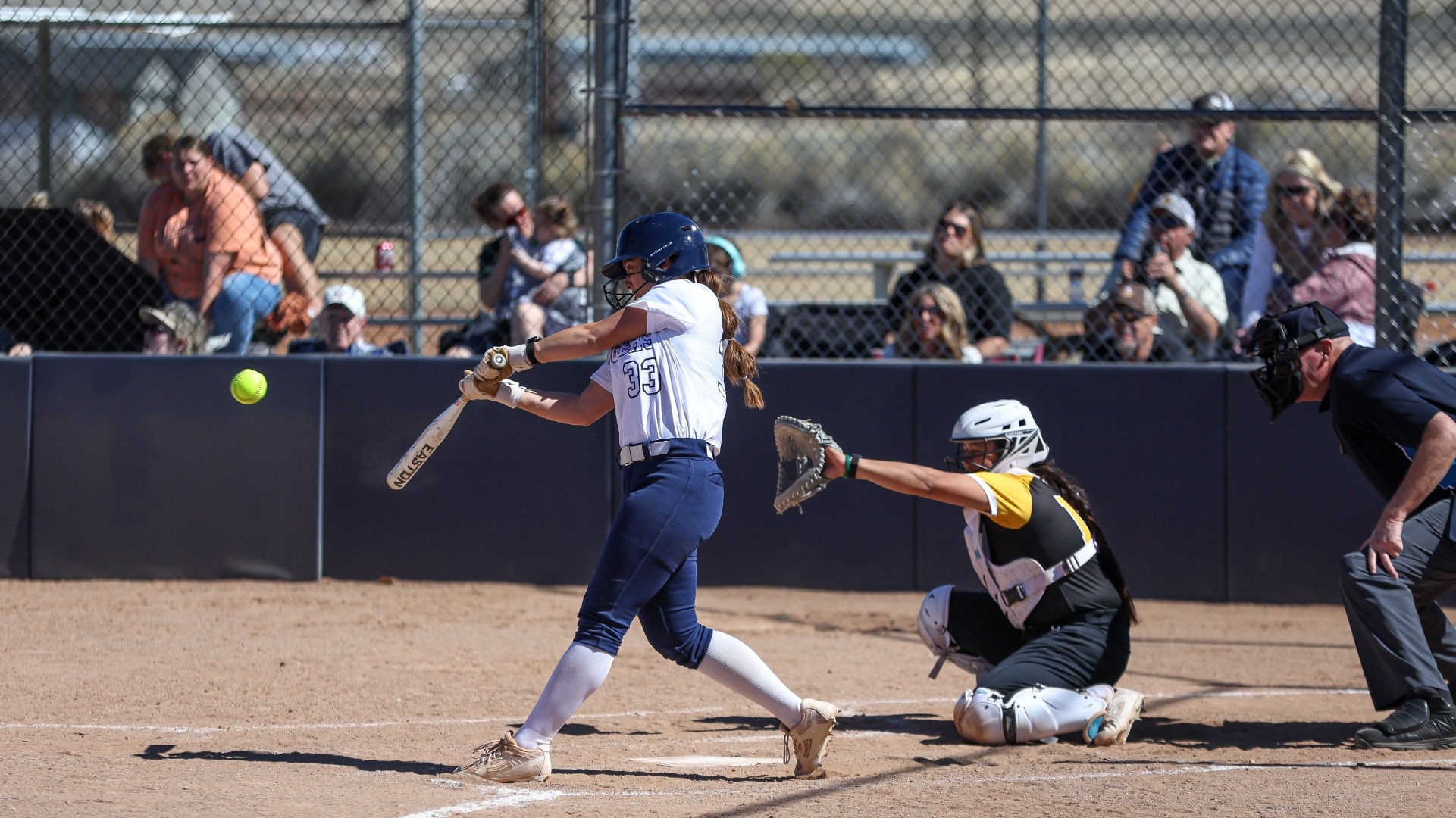 Grace Thomas hitting a line drive to right field
