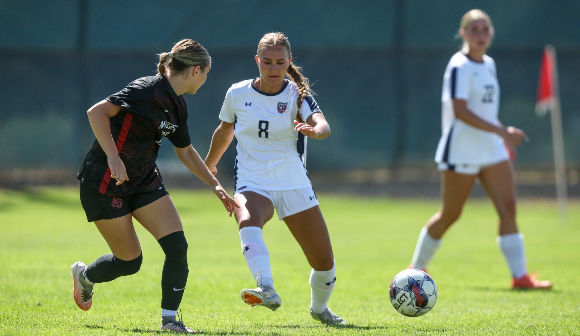 Monson advancing with the ball